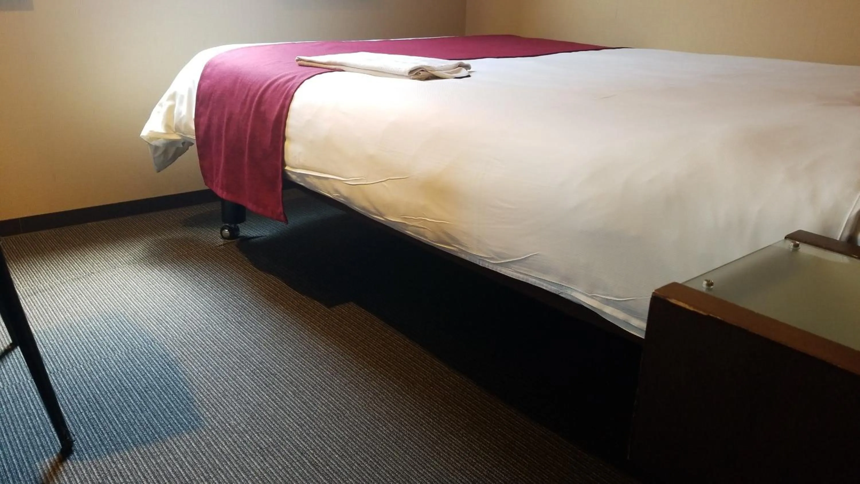 Bed in MyHotel Okazaki