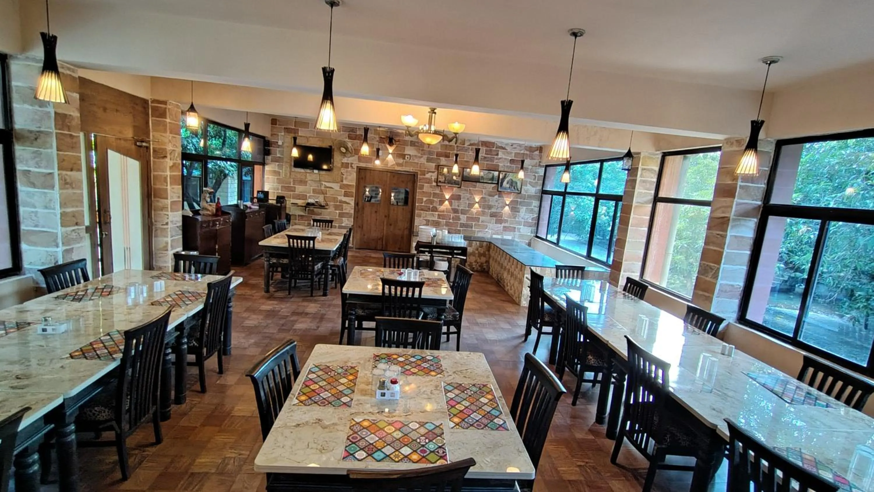 Restaurant/places to eat in Gir Lions Paw Resort with Swimming Pool