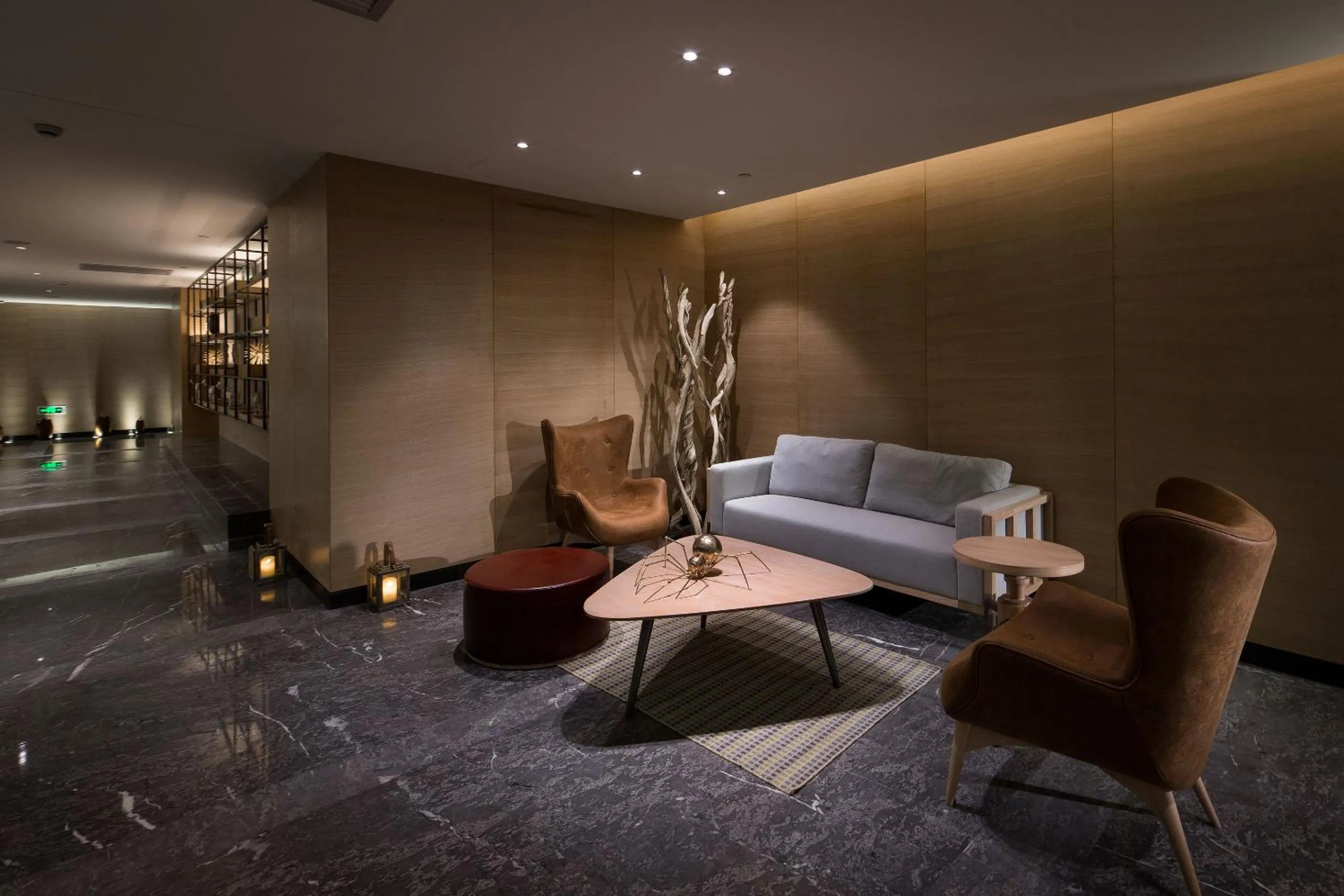 Communal lounge/ TV room in Swisstouches Guangzhou Hotel Residences