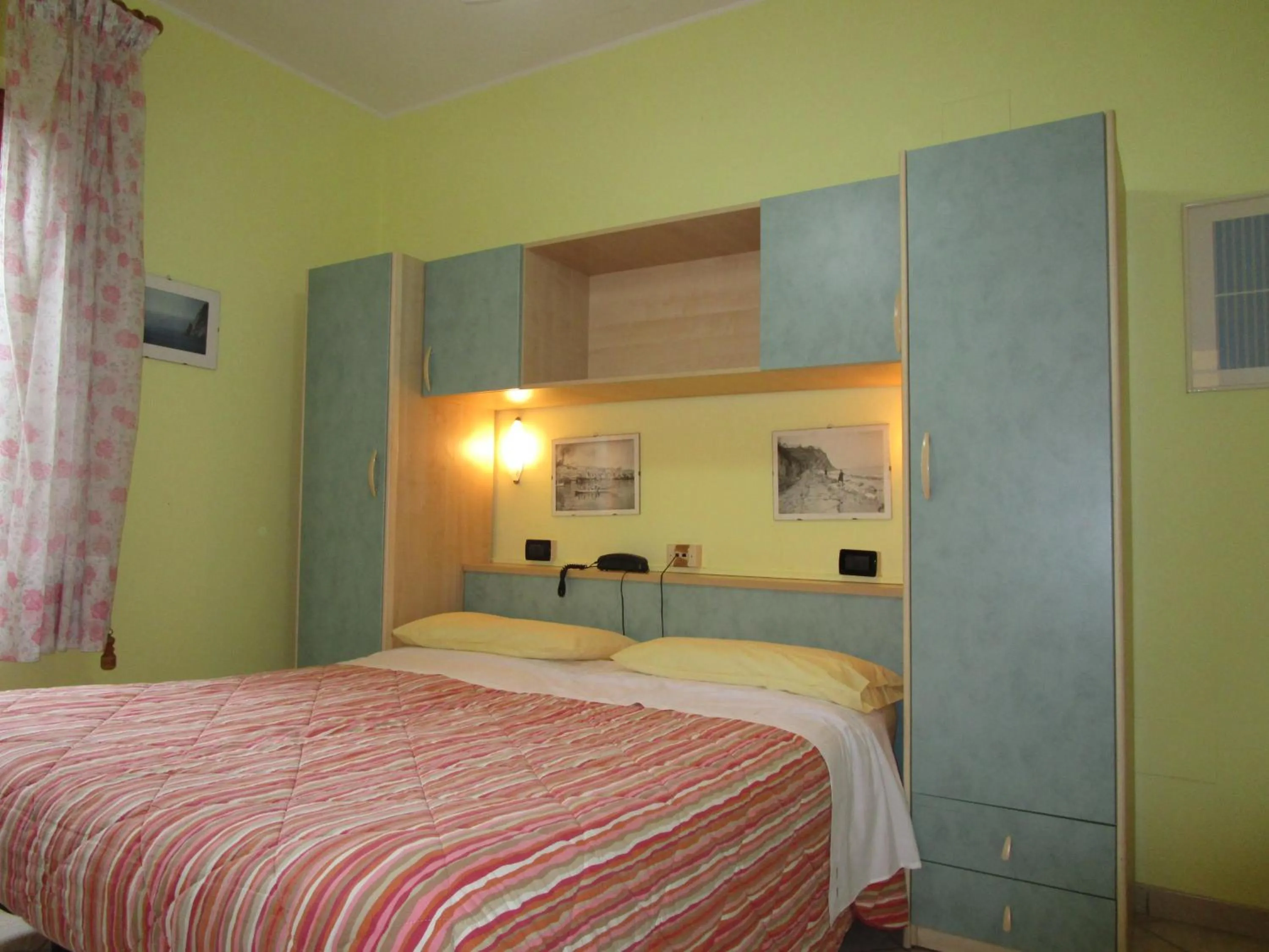 Photo of the whole room, Bed in Albergo Primavera