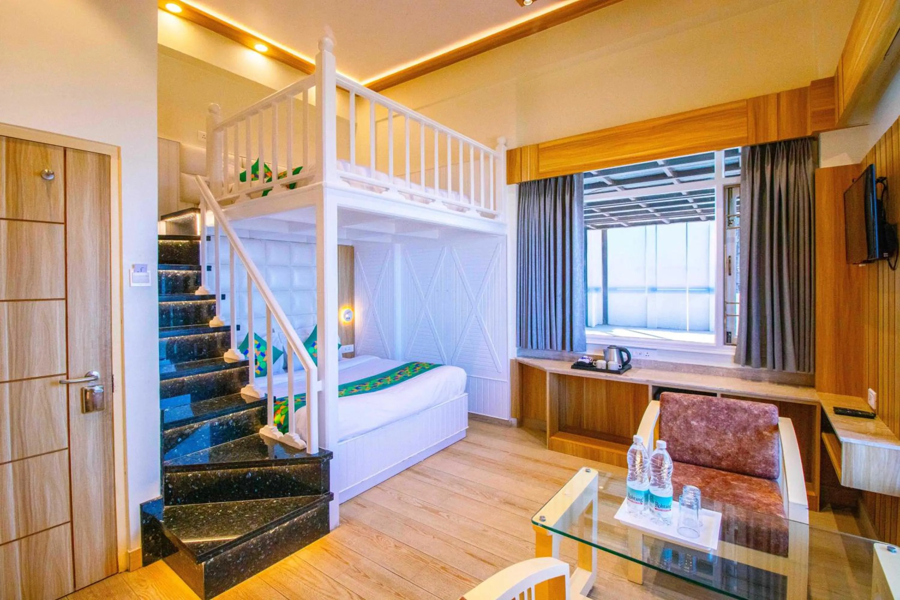 Bedroom in Treebo Varuna With Mountain View