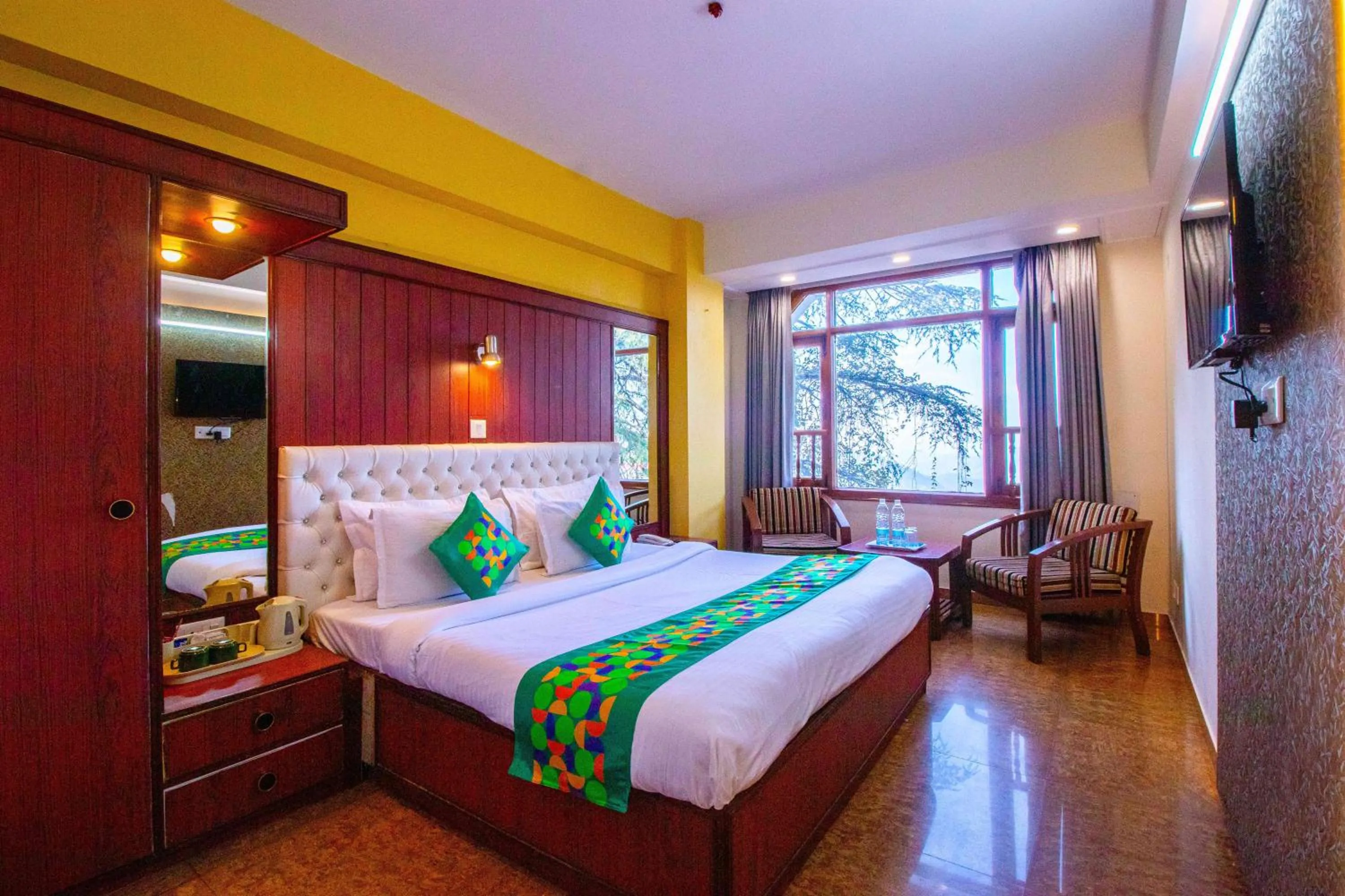 Bedroom, Bed in Treebo Varuna With Mountain View