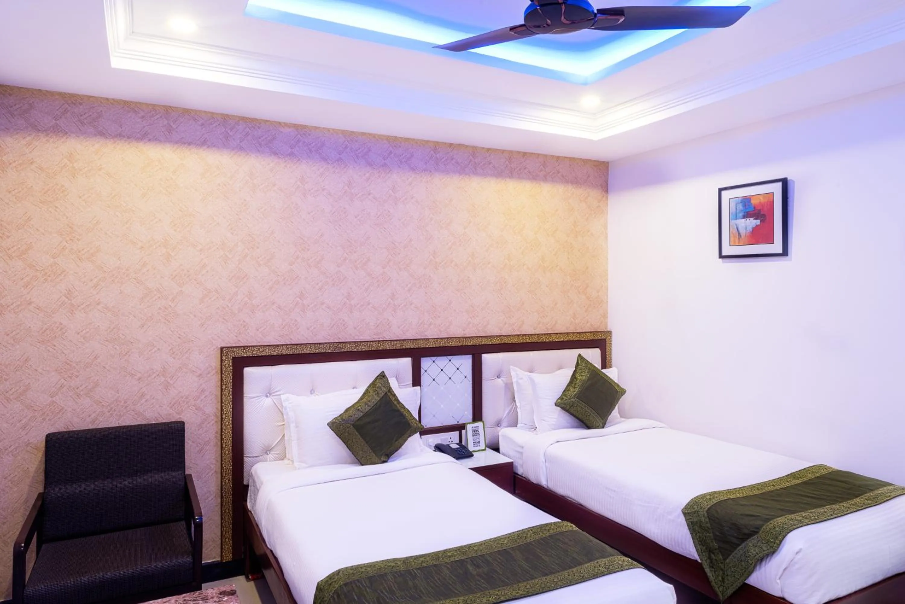 Bedroom, Bed in Treebo Empire