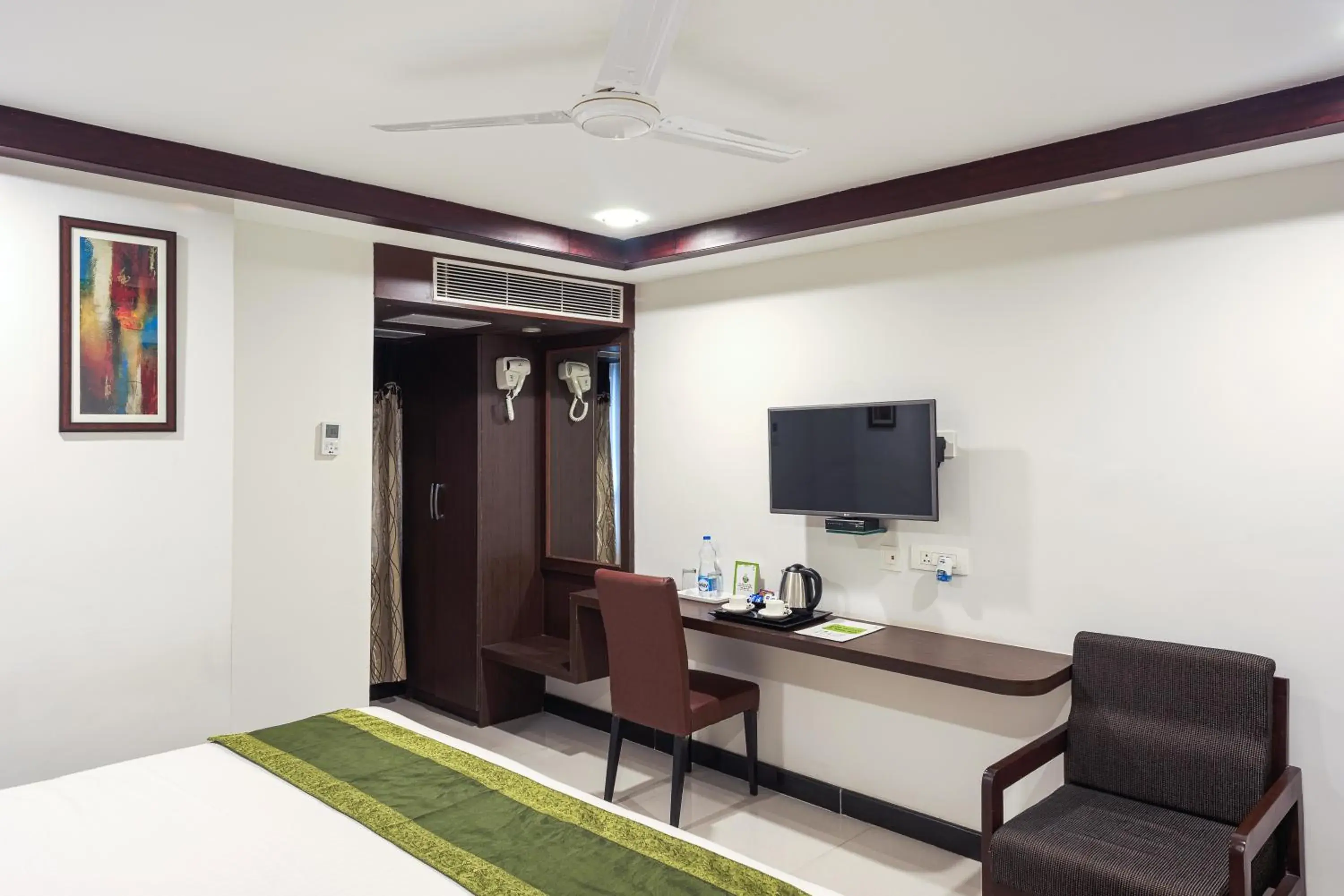 Bedroom, Bed in Treebo Empire Bedroom, Bed in Treebo Empire