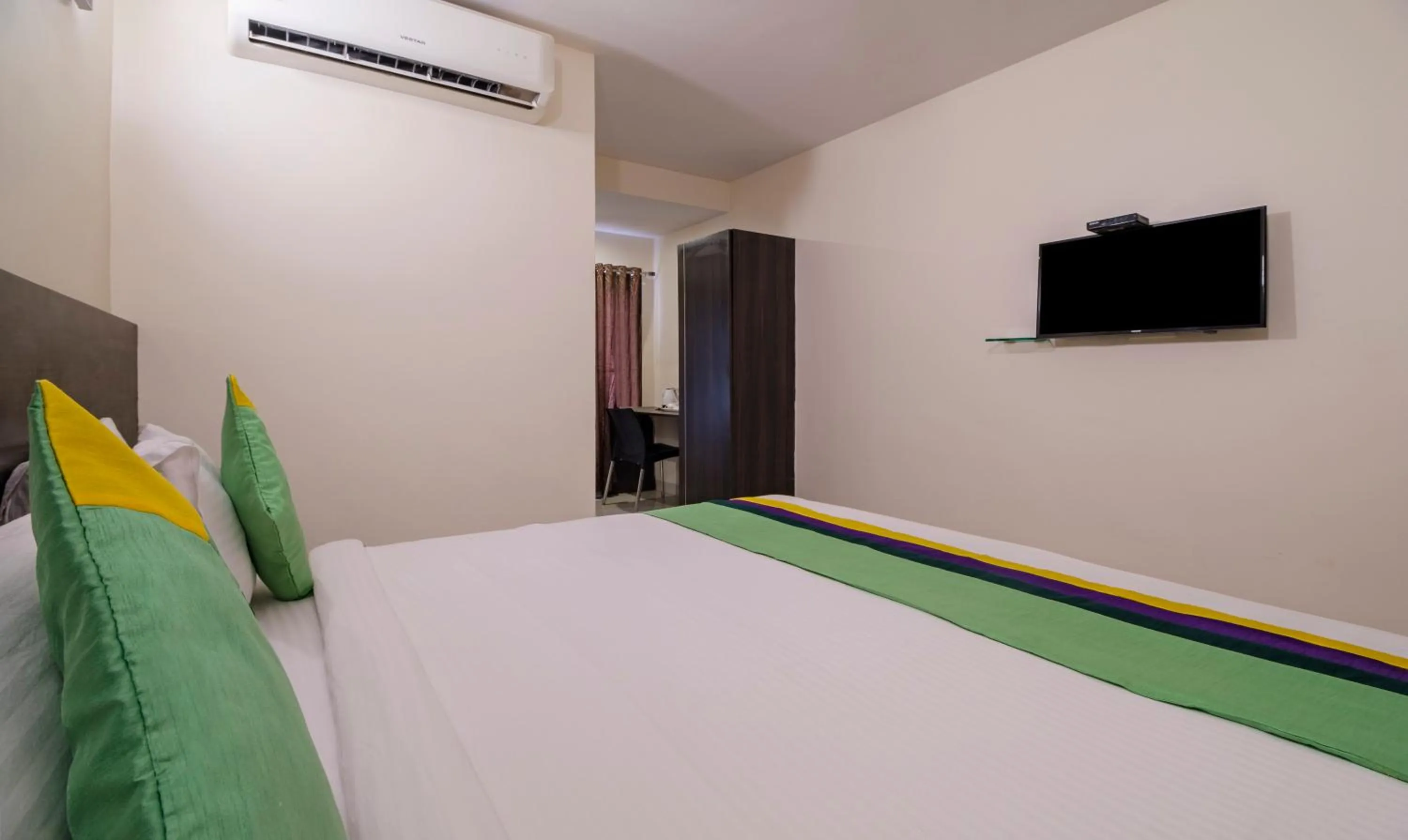 Bedroom, Bed in Treebo MVP Grand