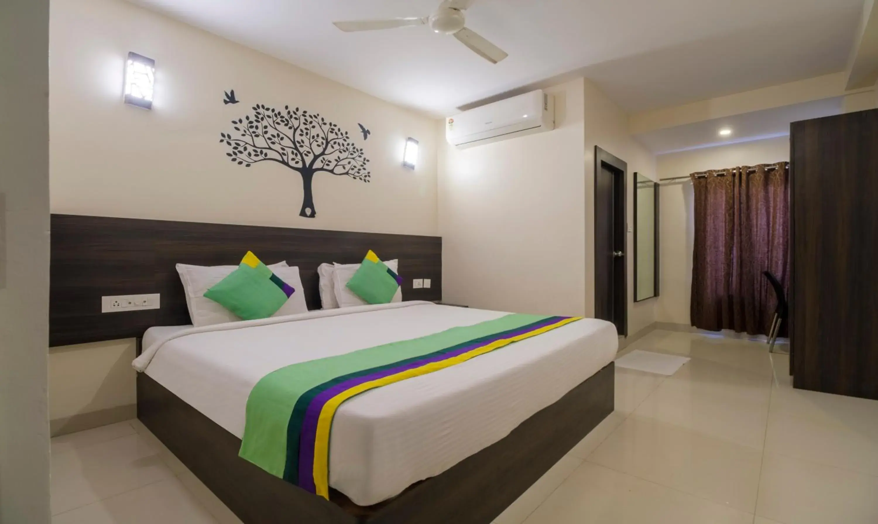 Photo of the whole room, Bed in Treebo MVP Grand Photo of the whole room, Bed in Treebo MVP Grand