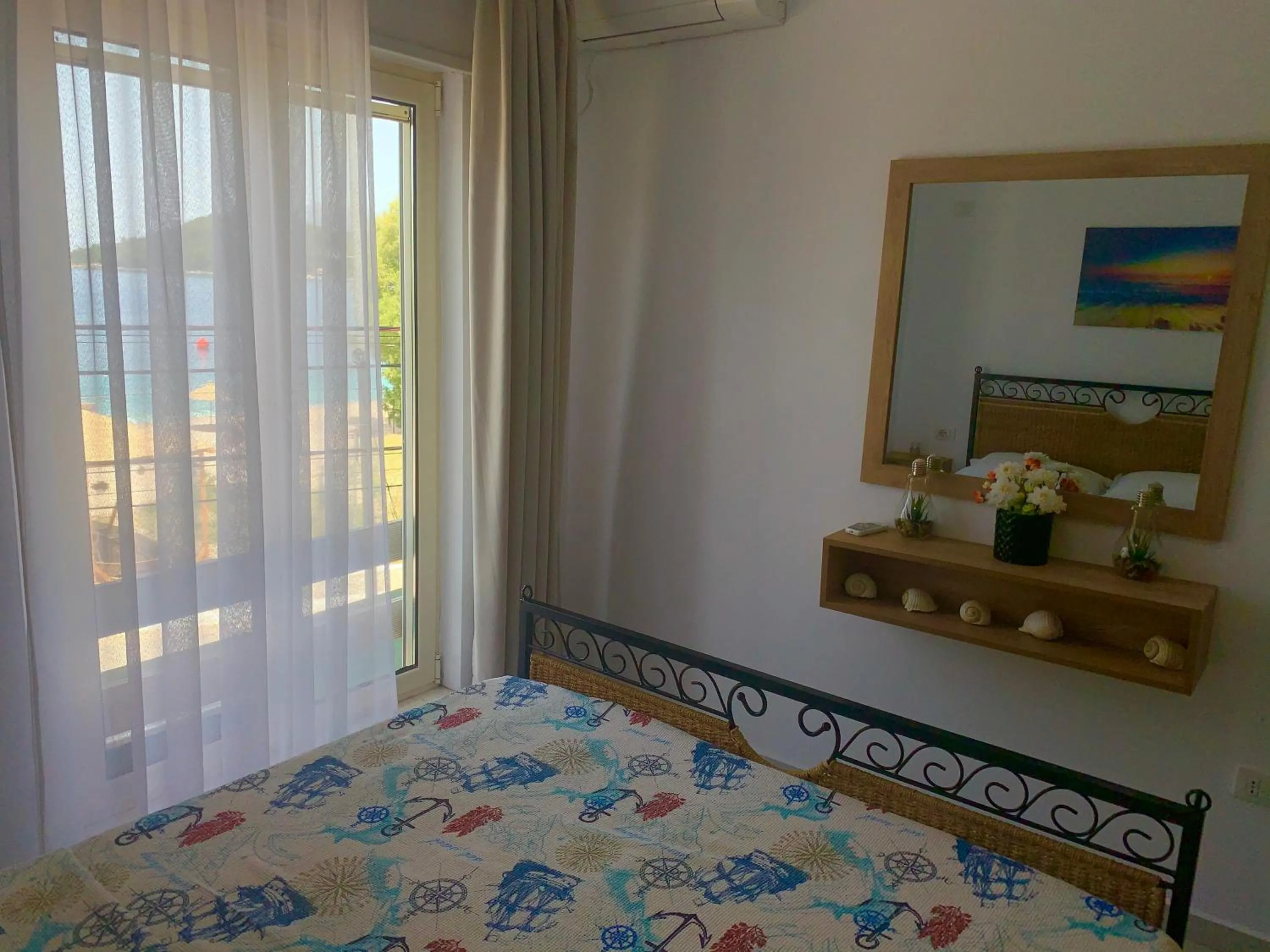 Bed in Sea Apartments Himare