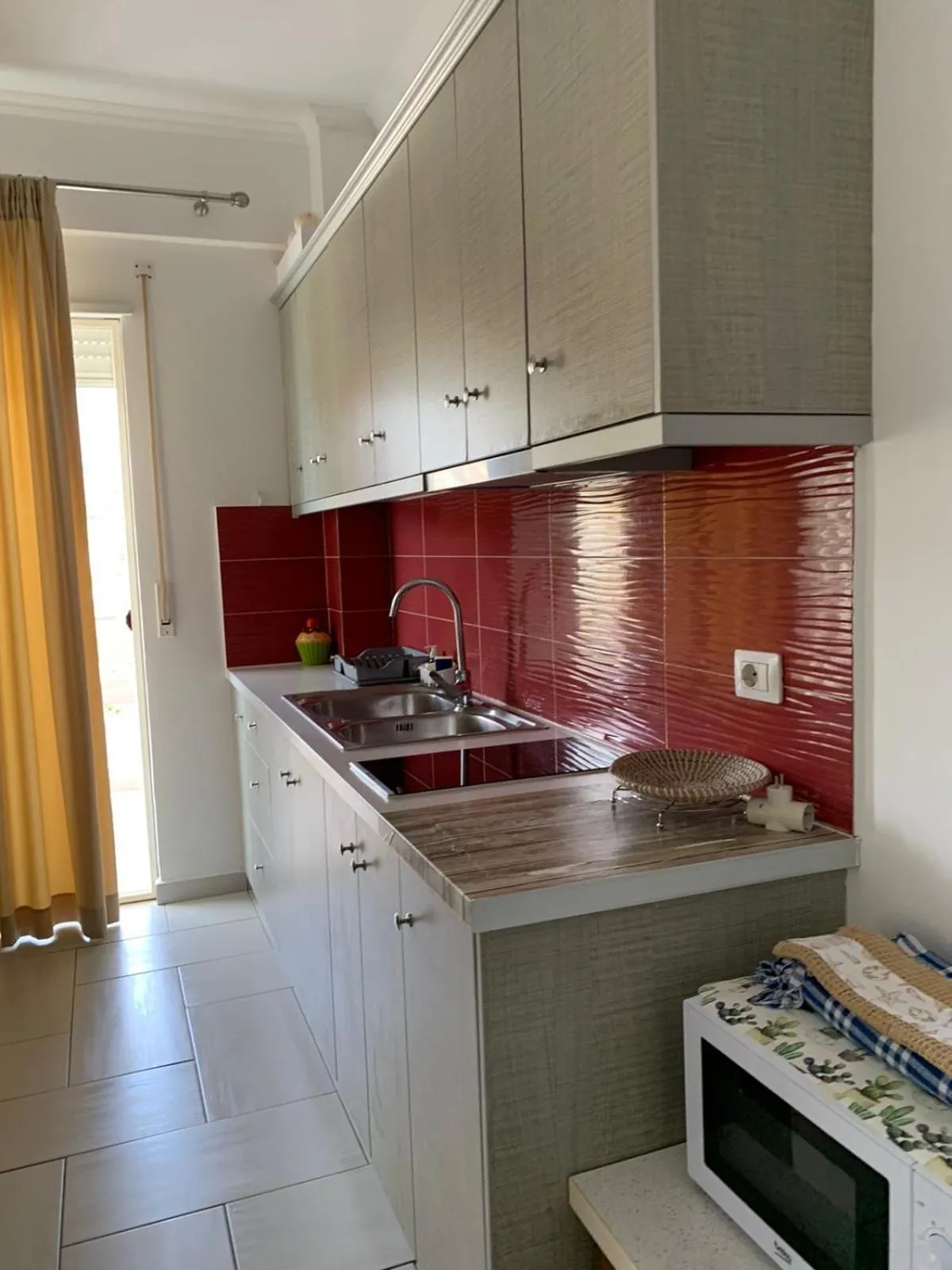 Kitchen or kitchenette in Sea Apartments Himare