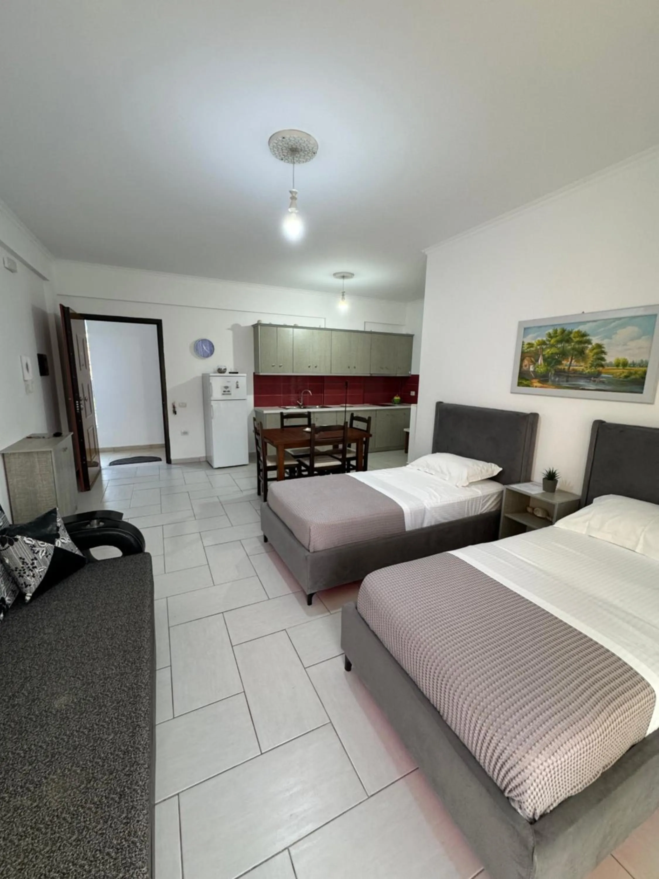 Living room, Bed in Sea Apartments Himare