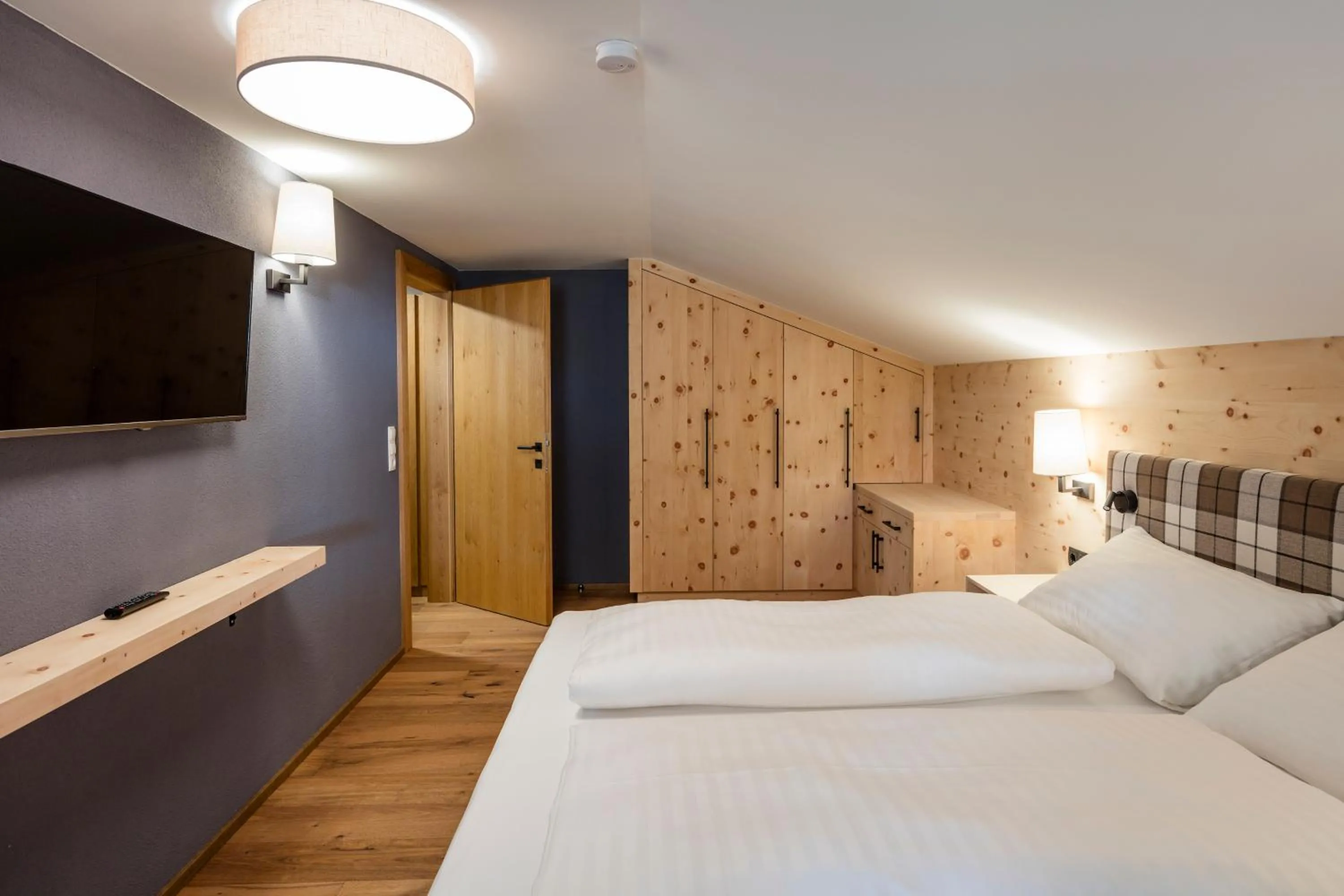 Bedroom, Bed in Alpbach Lodge Chalet Superior