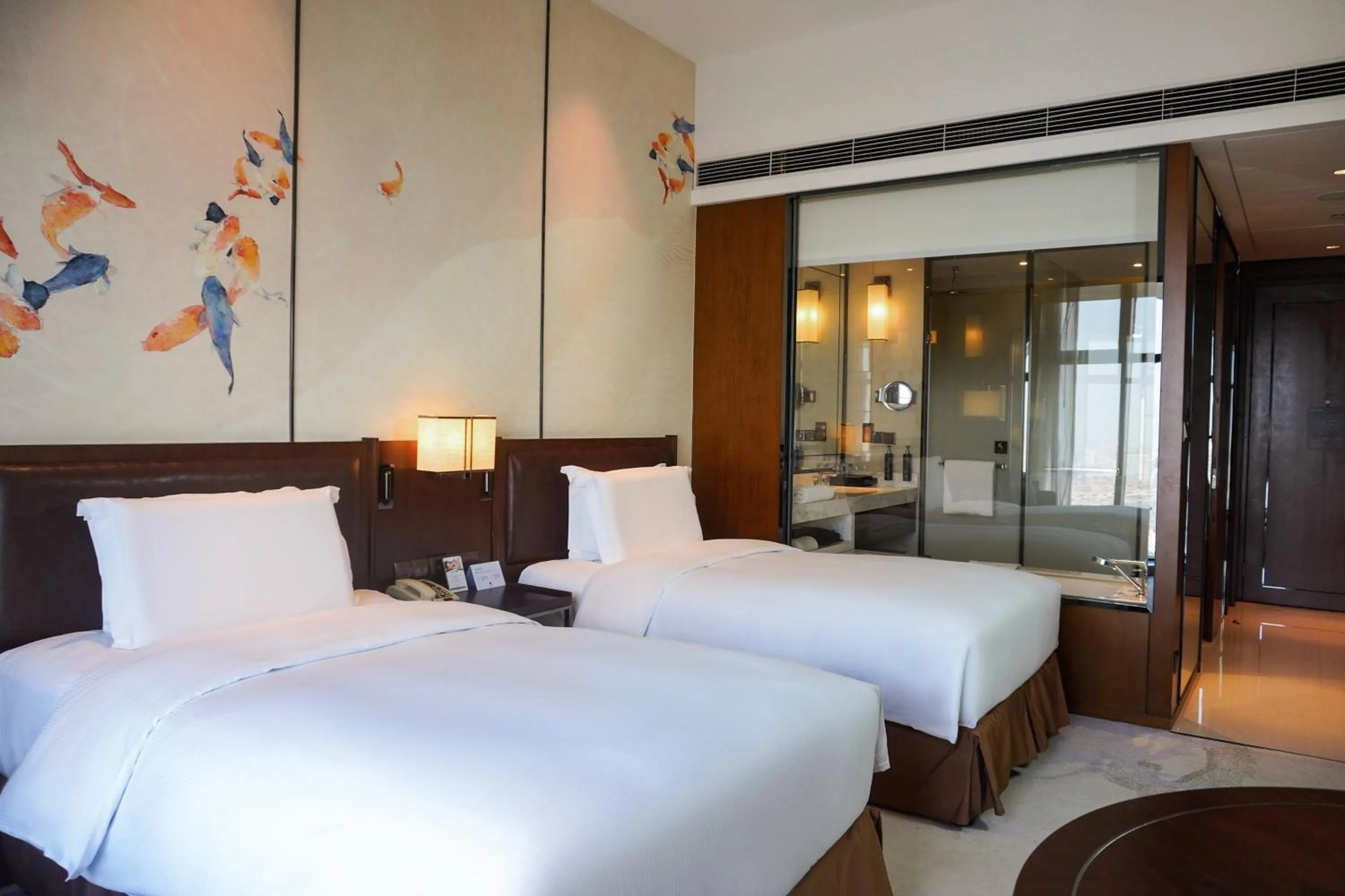 Bed in DoubleTree By Hilton Ningbo Beilun