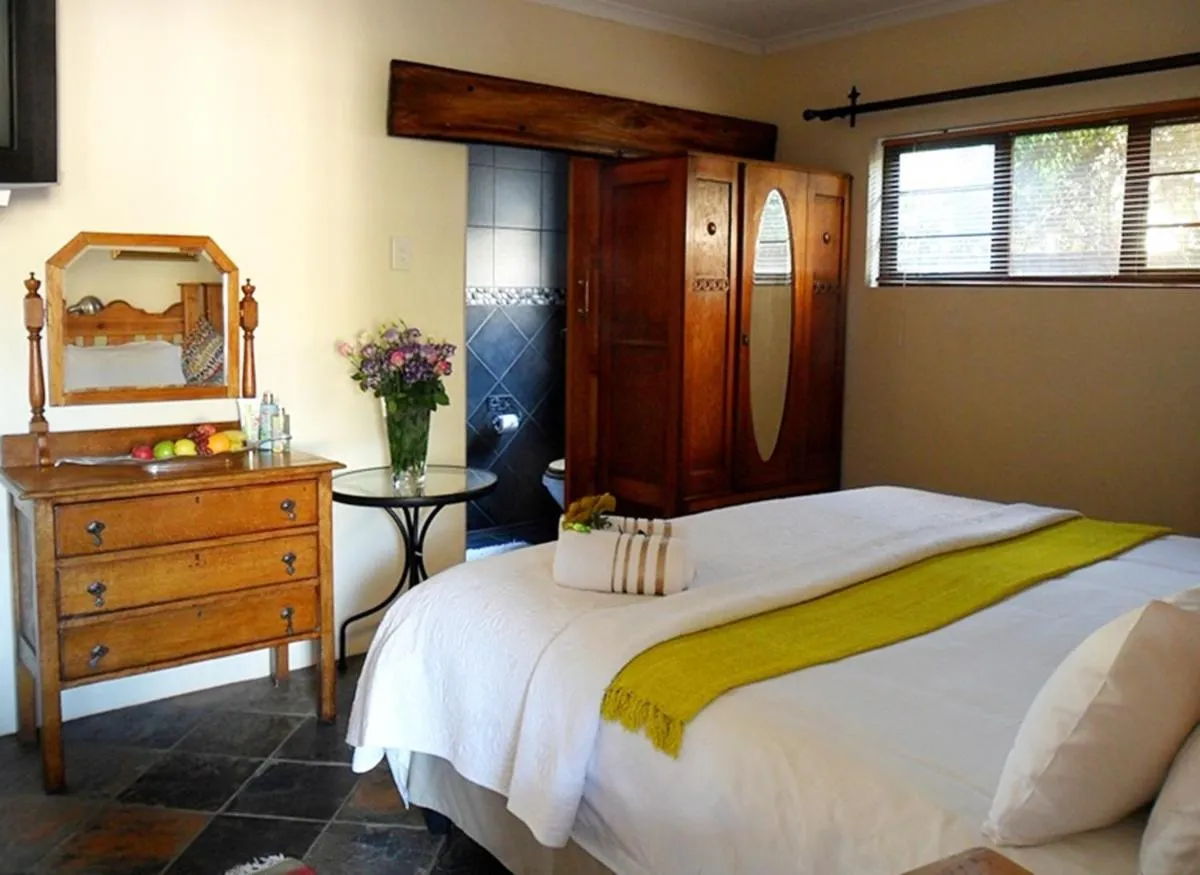 Bed in Greenleaf Guest Lodge