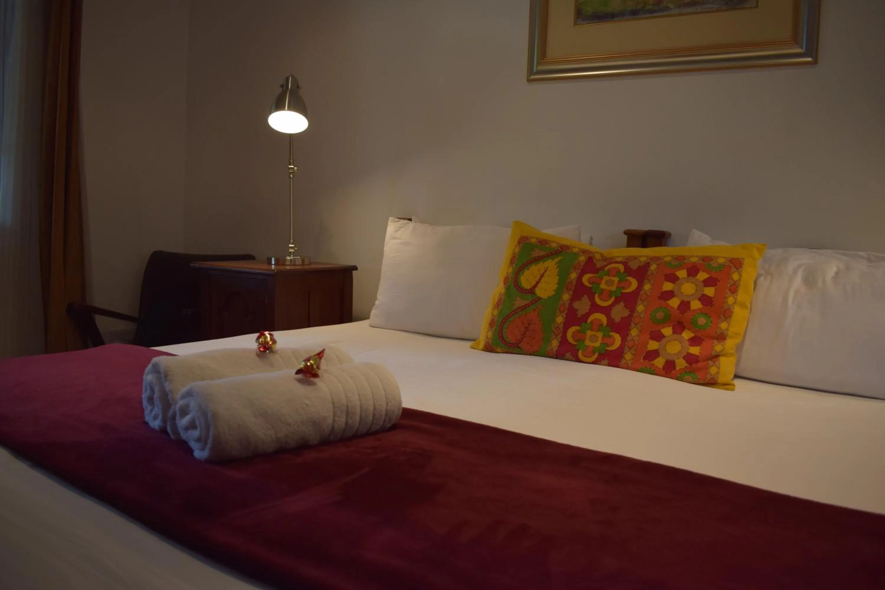 Bed in Greenleaf Guest Lodge