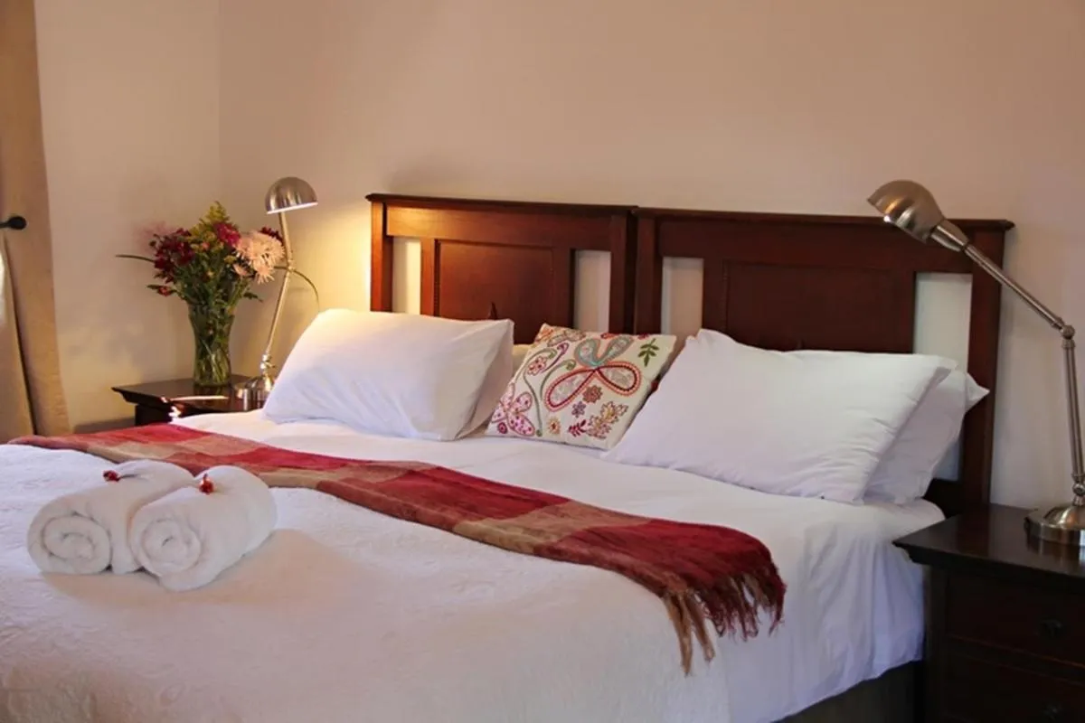 Bed in Greenleaf Guest Lodge