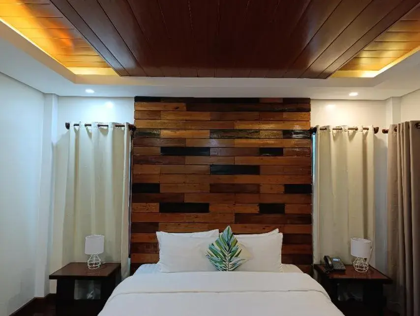 Bed in The Nest El Nido Beach Resort Bed in The Nest El Nido Beach Resort