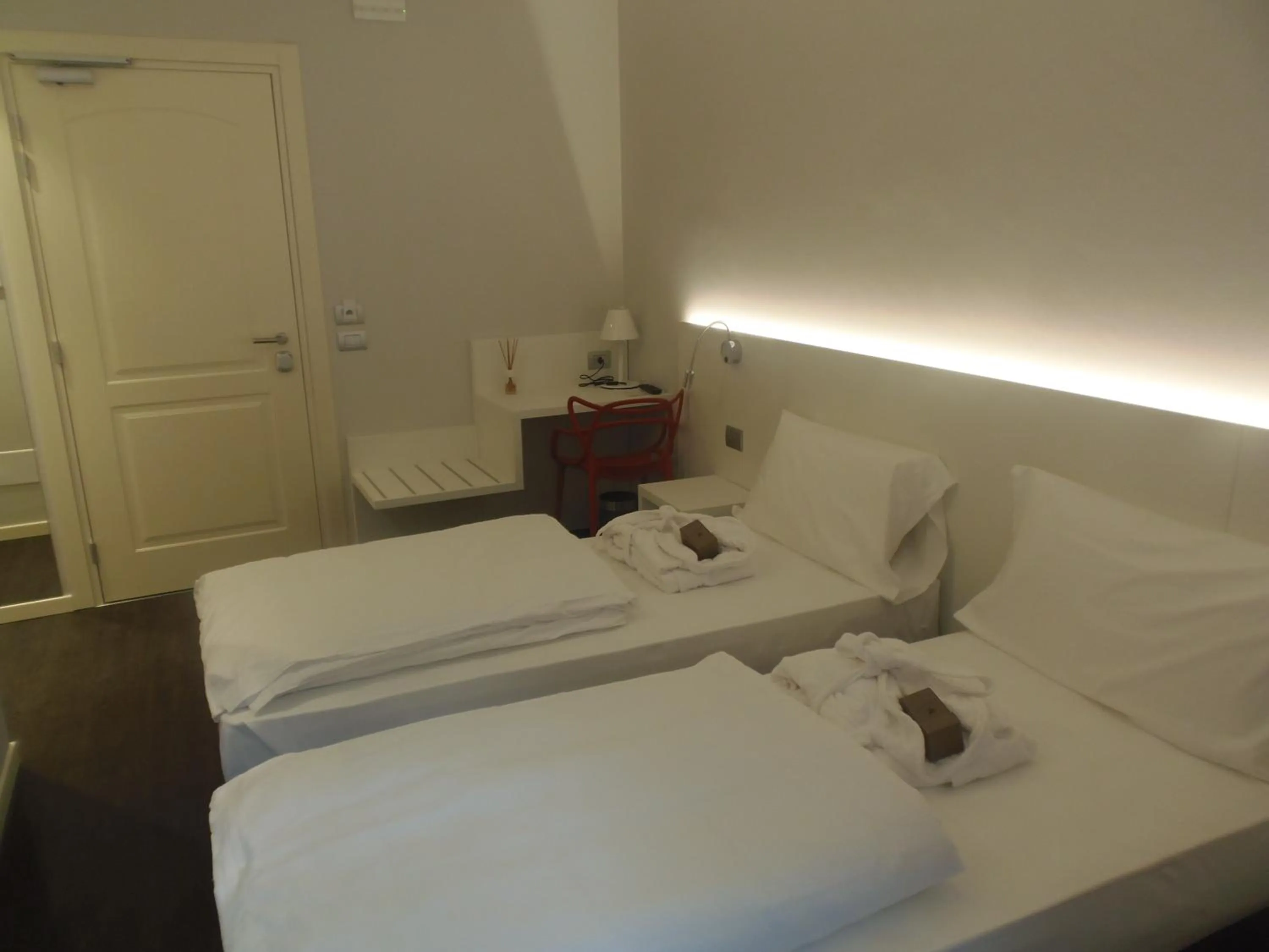 Bed in Albergo Dongo