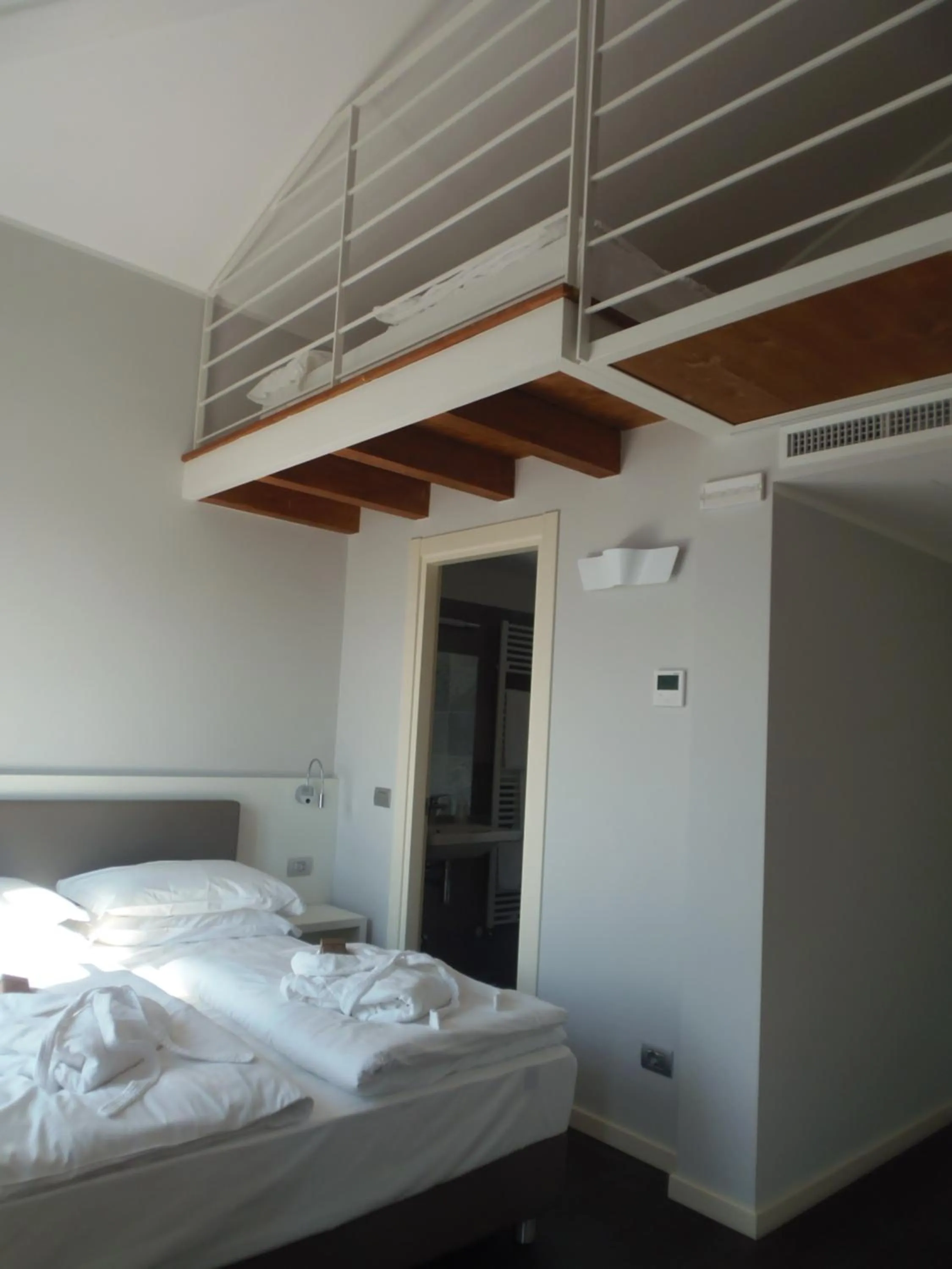 Bed in Albergo Dongo