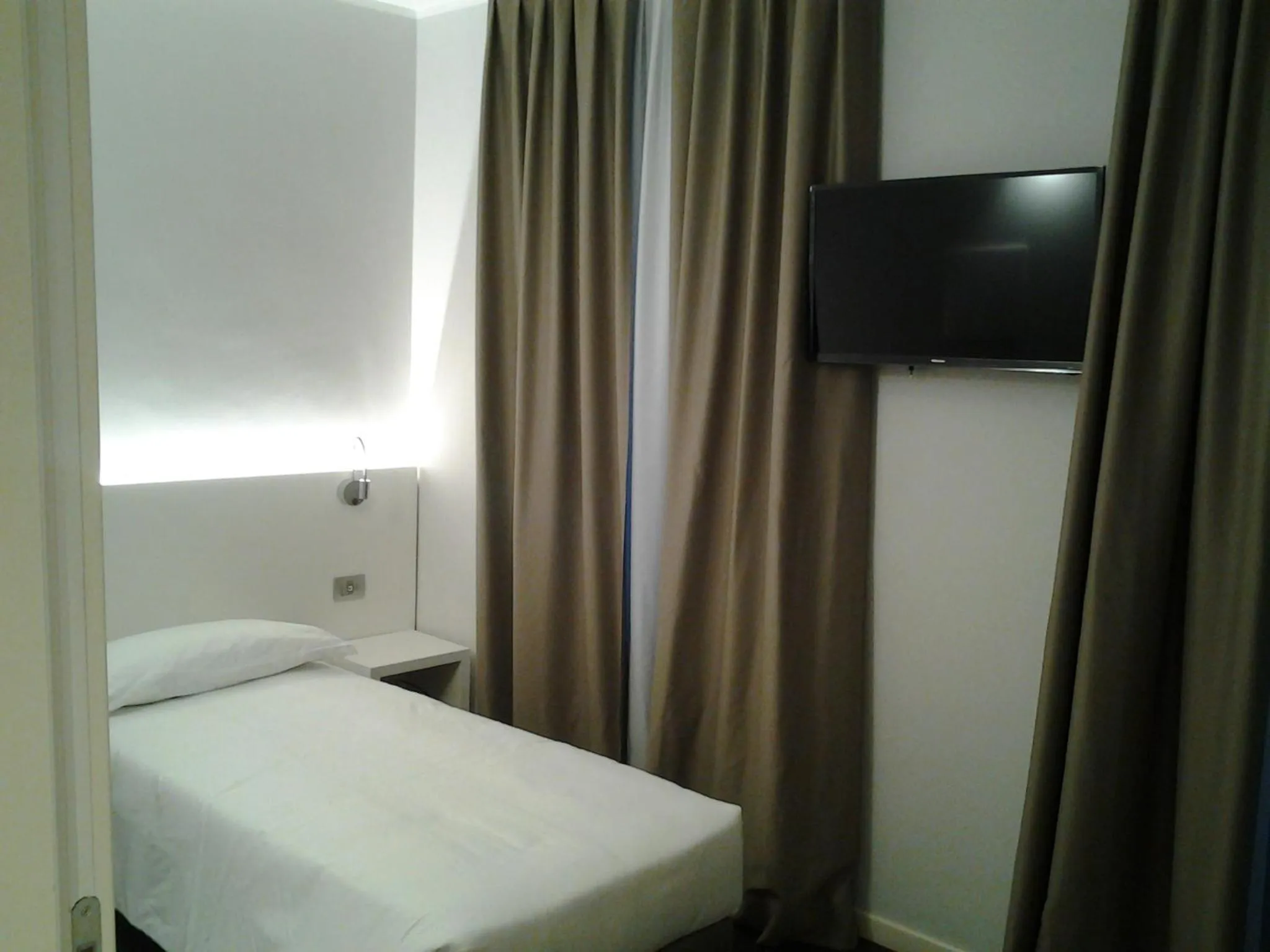 Bed in Albergo Dongo