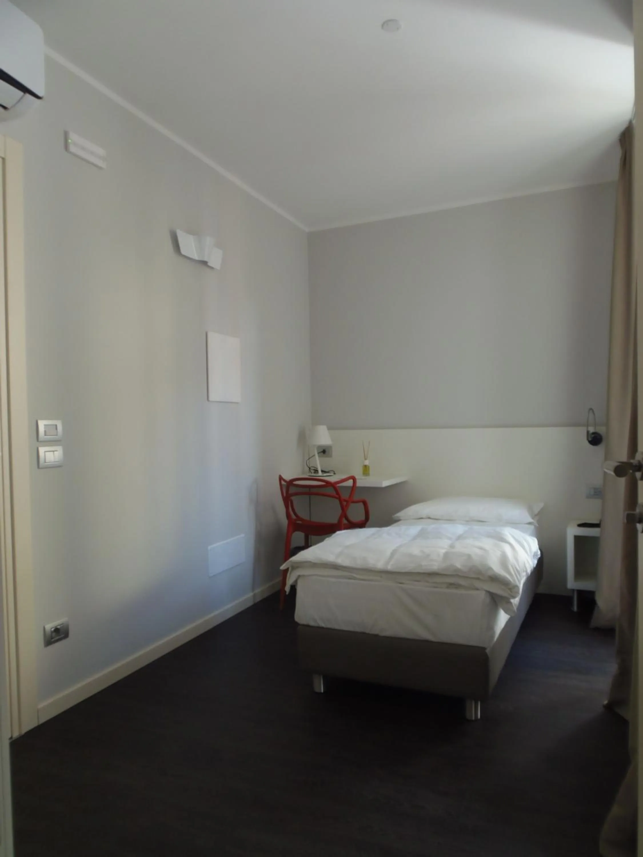 Bed in Albergo Dongo