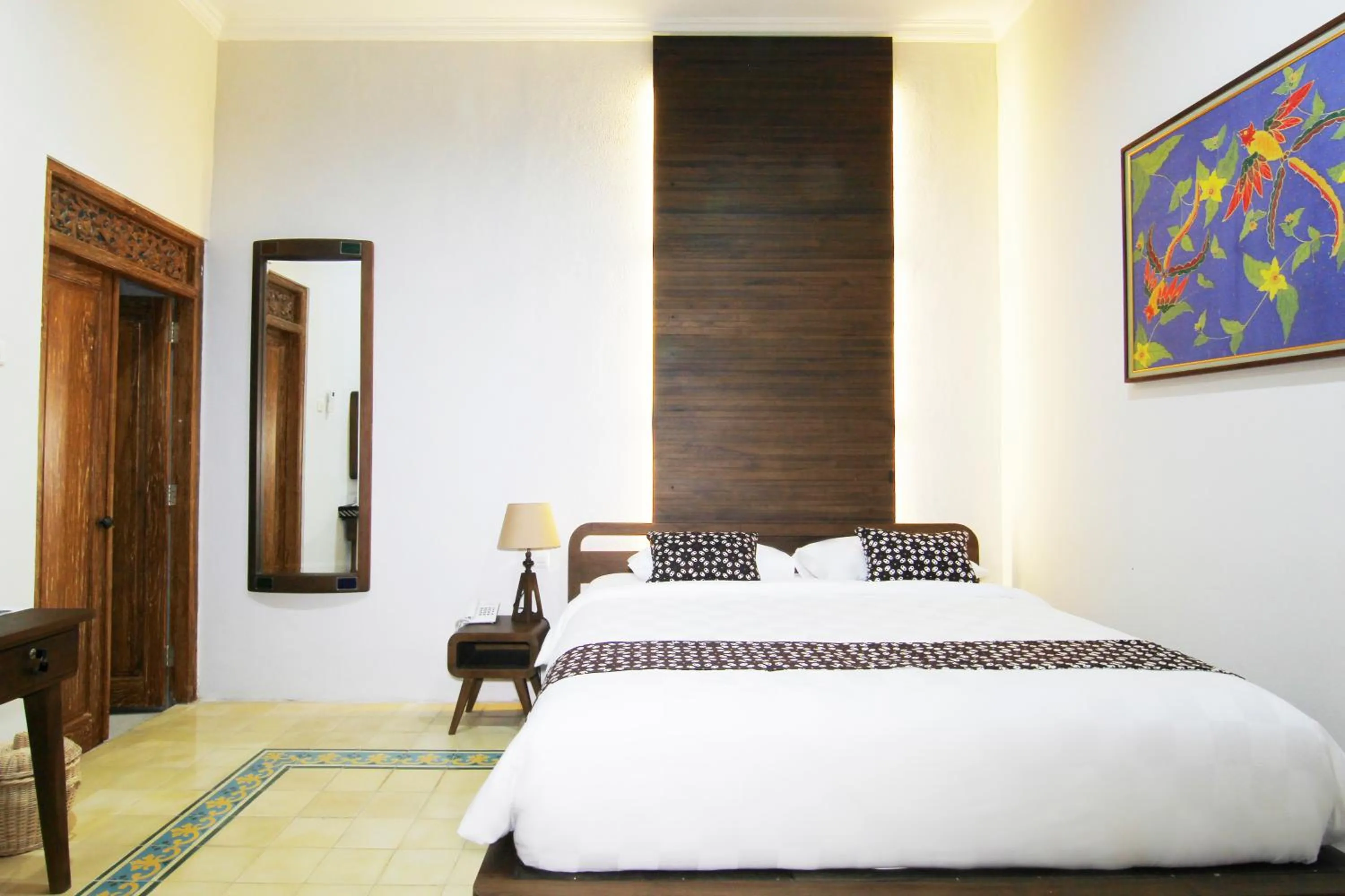Bed in Joglo Mandapa Boutique Hotel