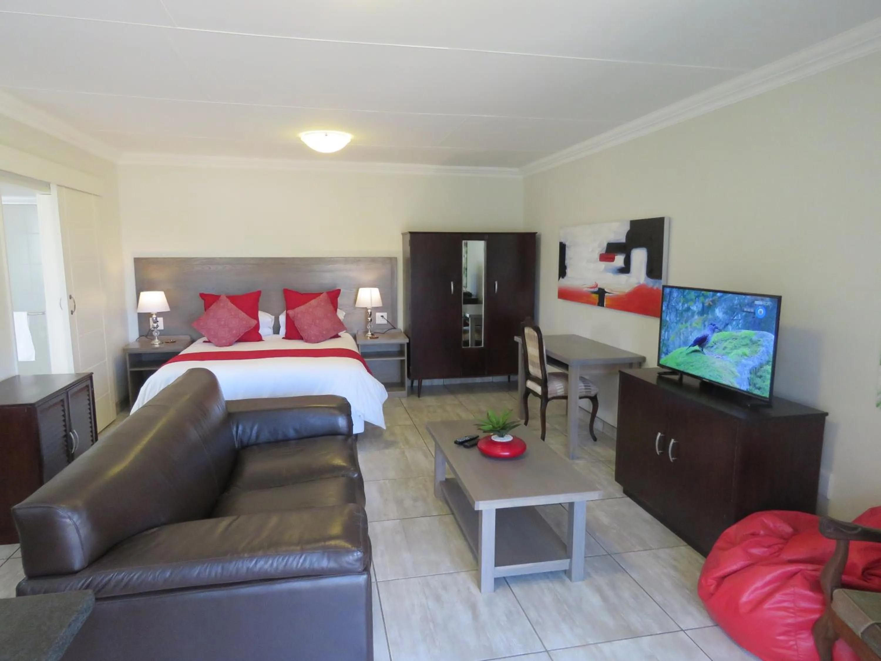 Living room, Bed in Sunbird Garden Cottage