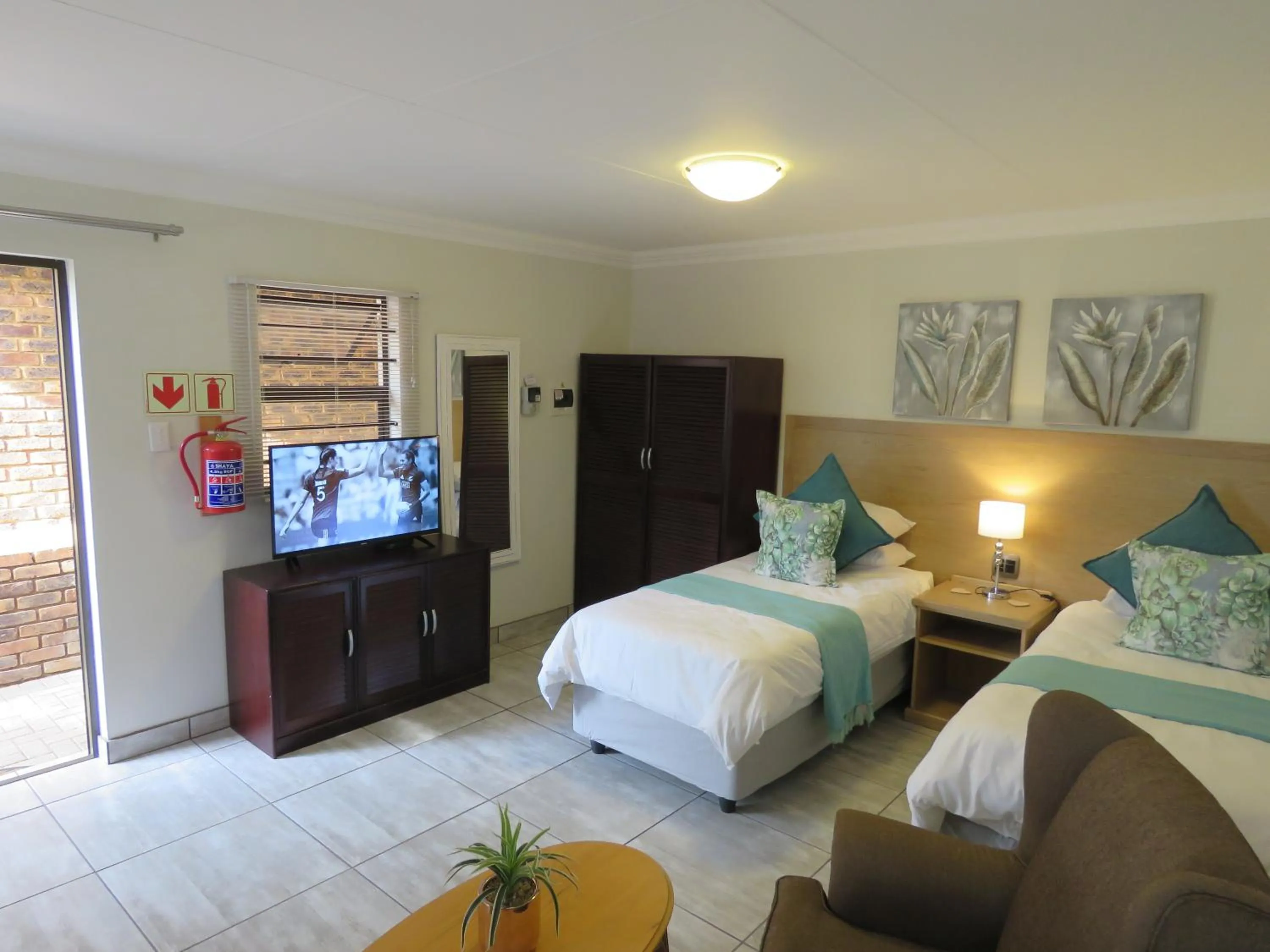 Bed in Sunbird Garden Cottage