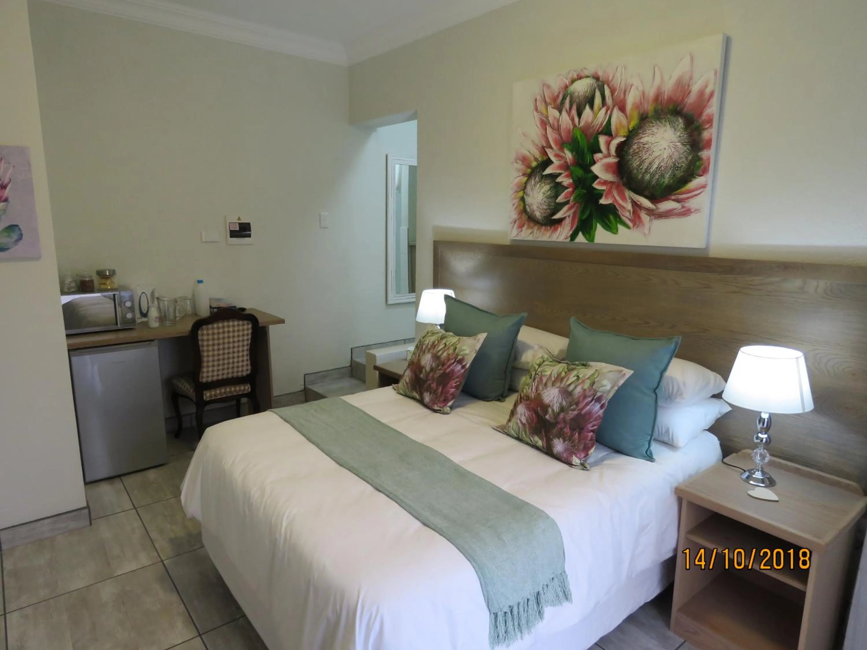 Bed in Sunbird Garden Cottage