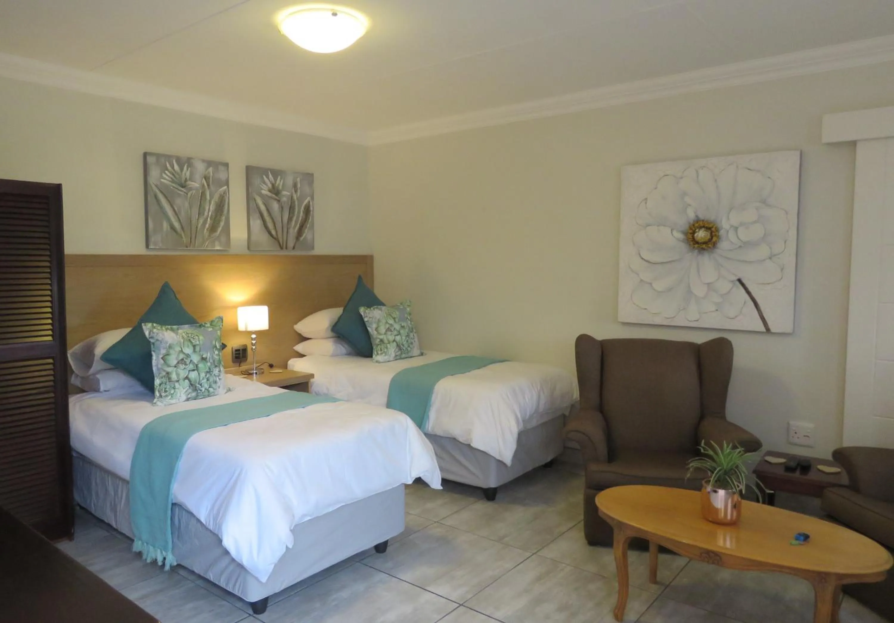 Bed in Sunbird Garden Cottage