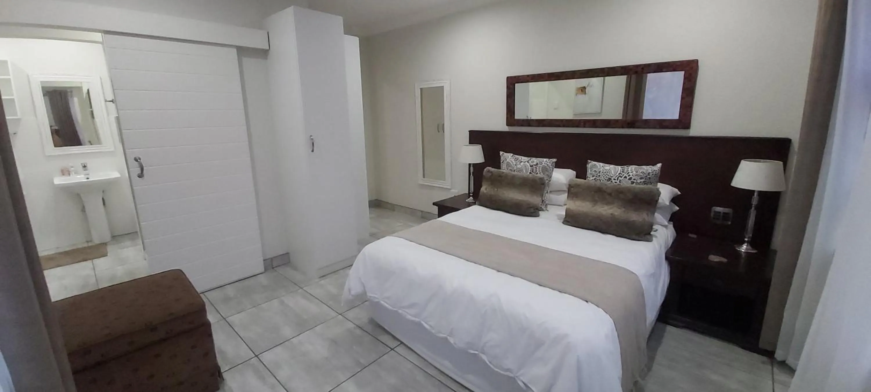 Bed in Sunbird Garden Cottage