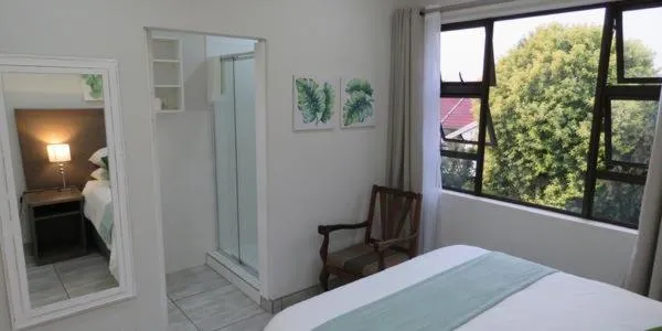 Bed in Sunbird Garden Cottage