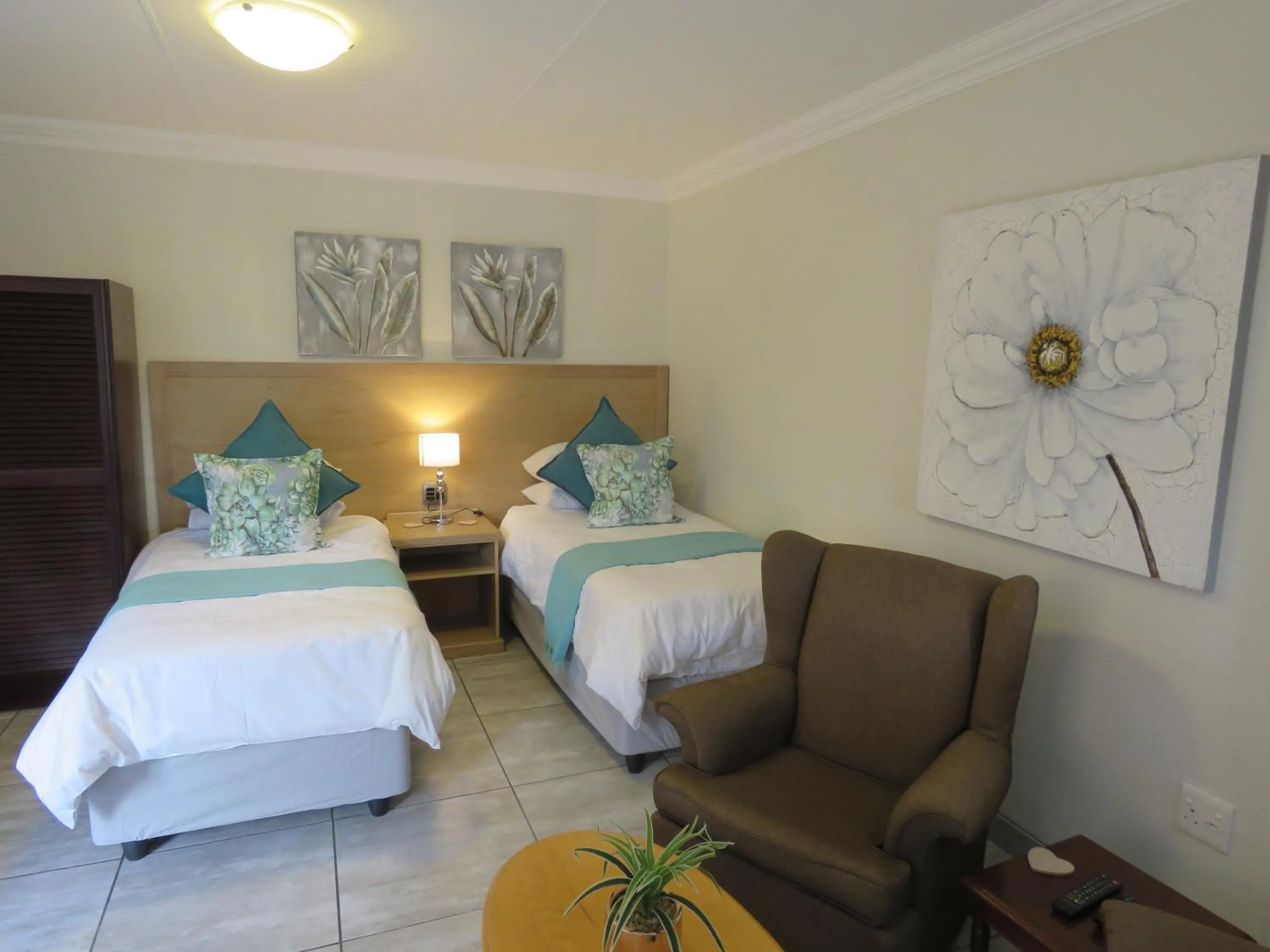 Bed in Sunbird Garden Cottage