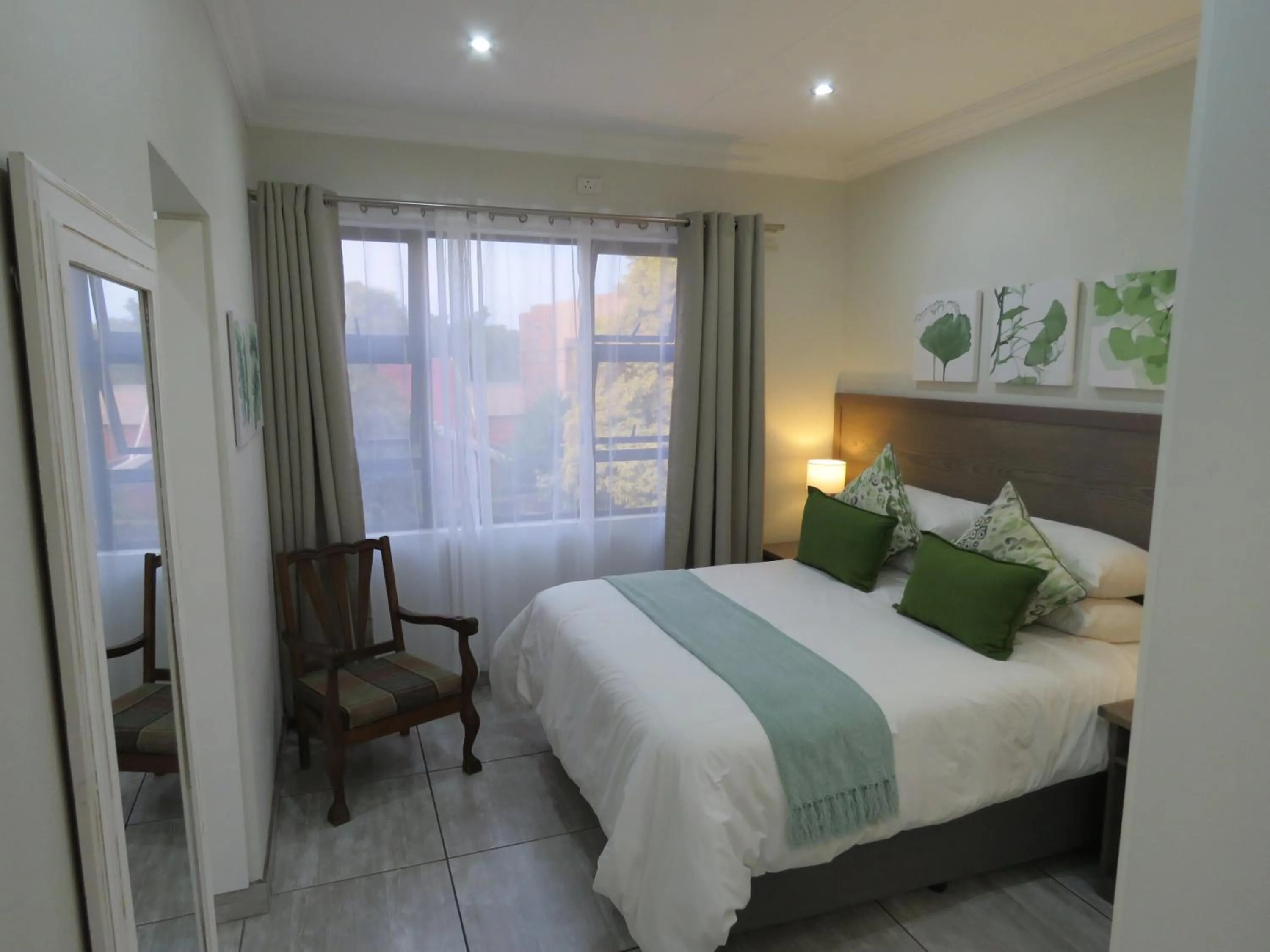 Bed in Sunbird Garden Cottage