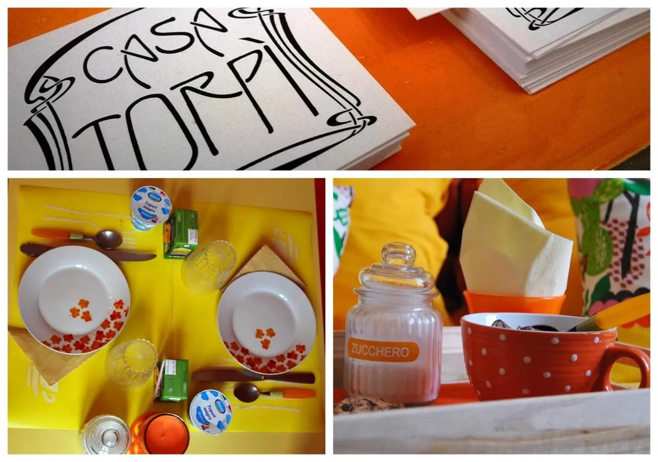 Communal lounge/ TV room in B&B Casa Torpì