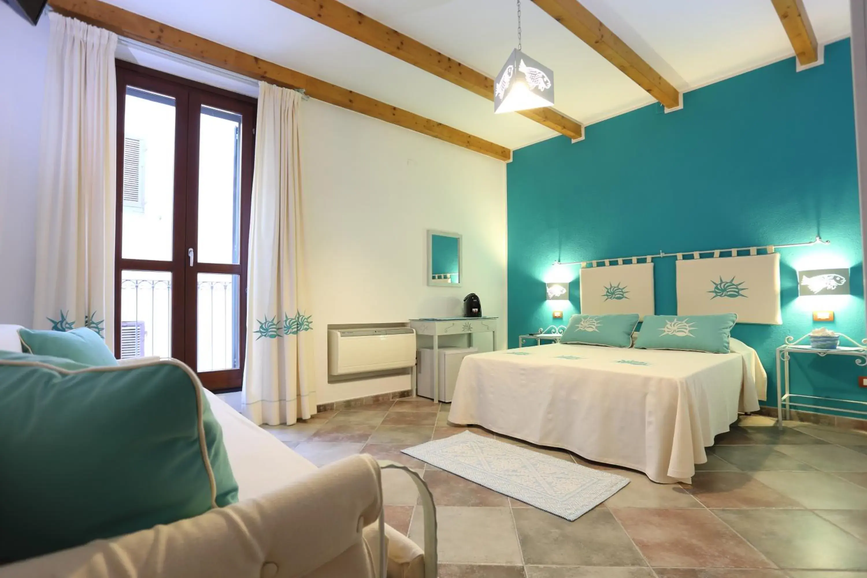 Quadruple Room with Private Bathroom in Palau De Rosa Quadruple Room with Private Bathroom in Palau De Rosa