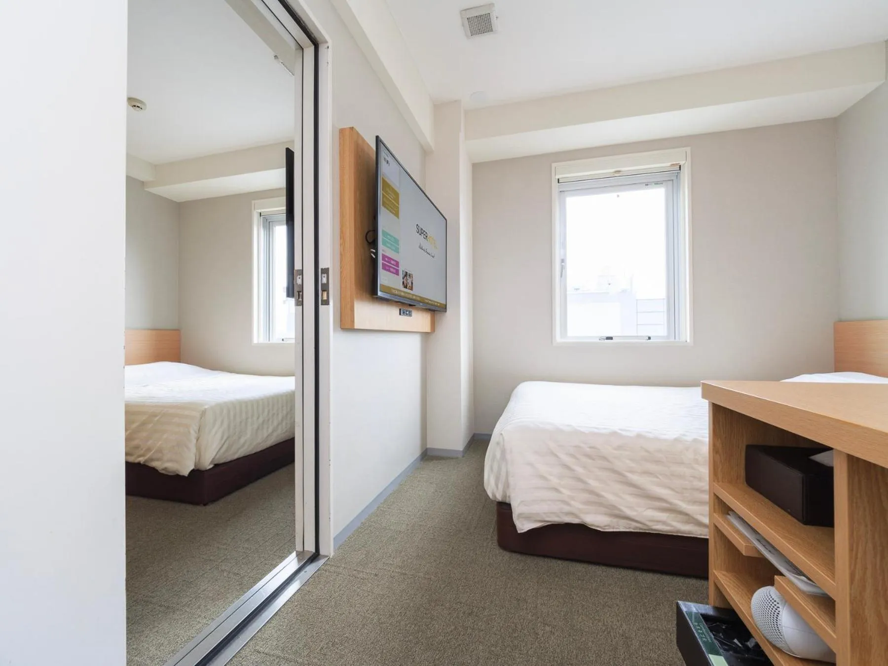 Bed in Super Hotel Ueno-Okachimachi