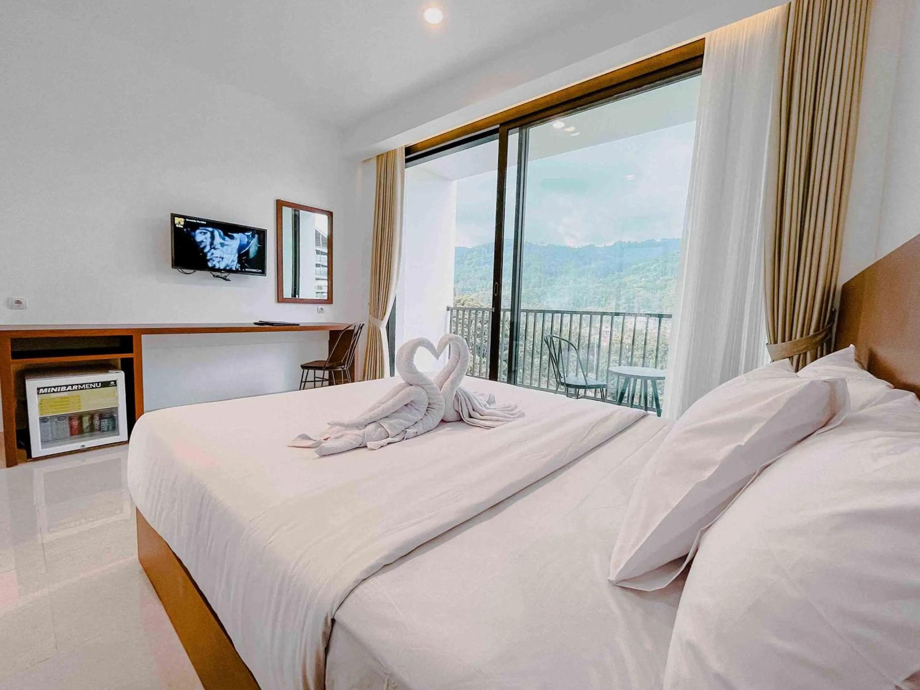 Bed in Hotel Ariandri Puncak