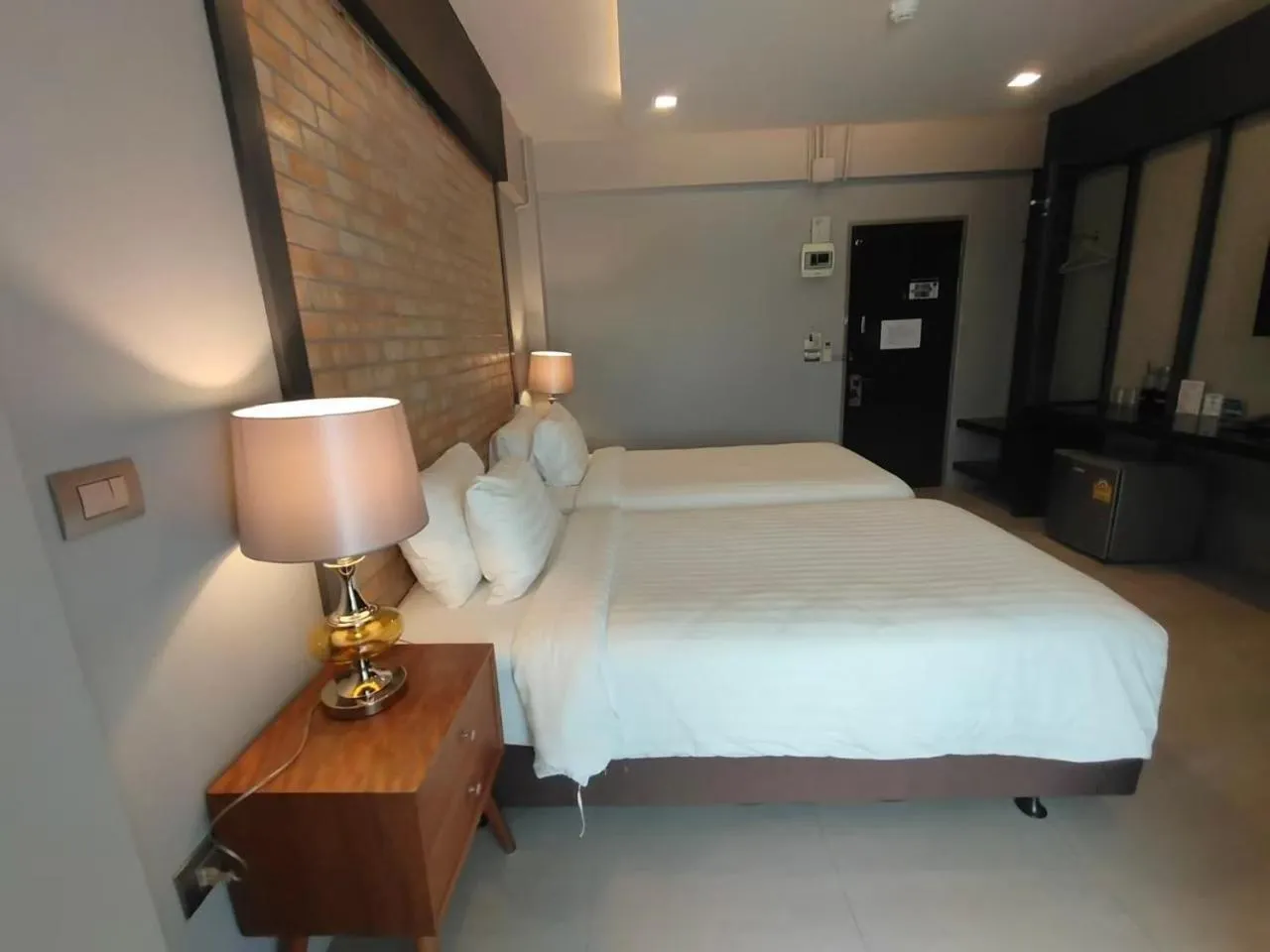 Bed in Qoo Hotel