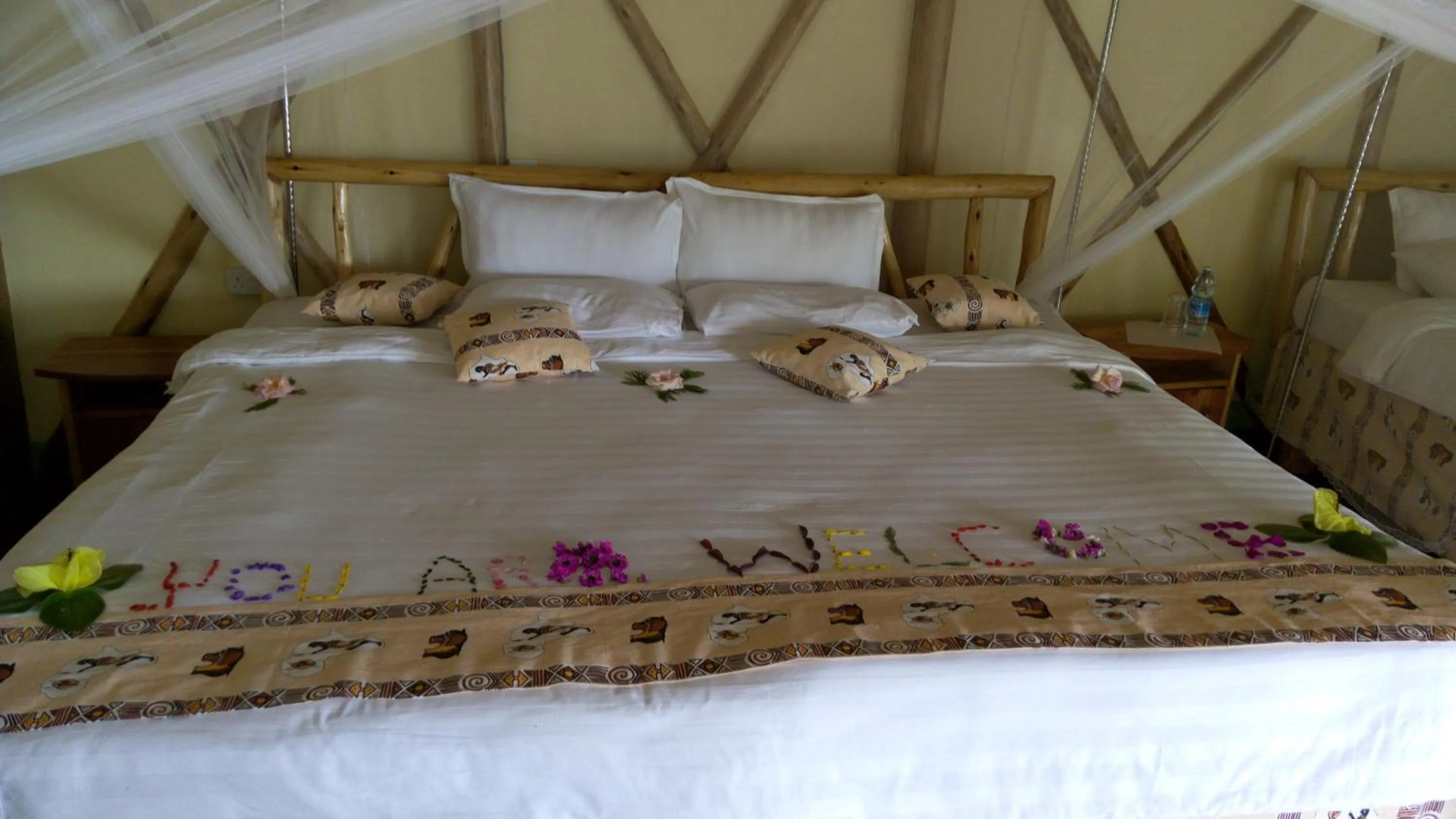 Bed in Lake Bunyonyi Rock Resort