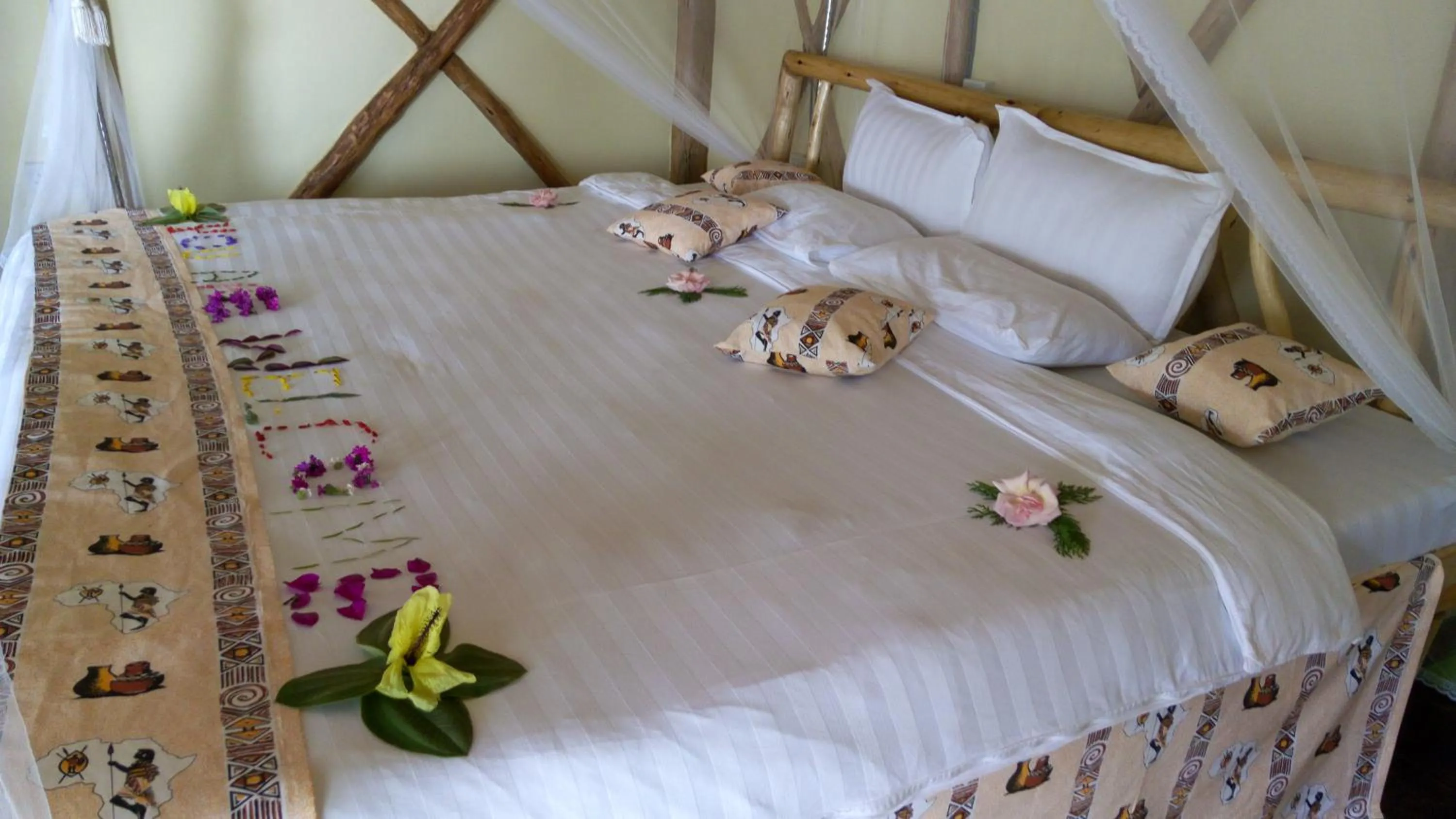 Bed in Lake Bunyonyi Rock Resort