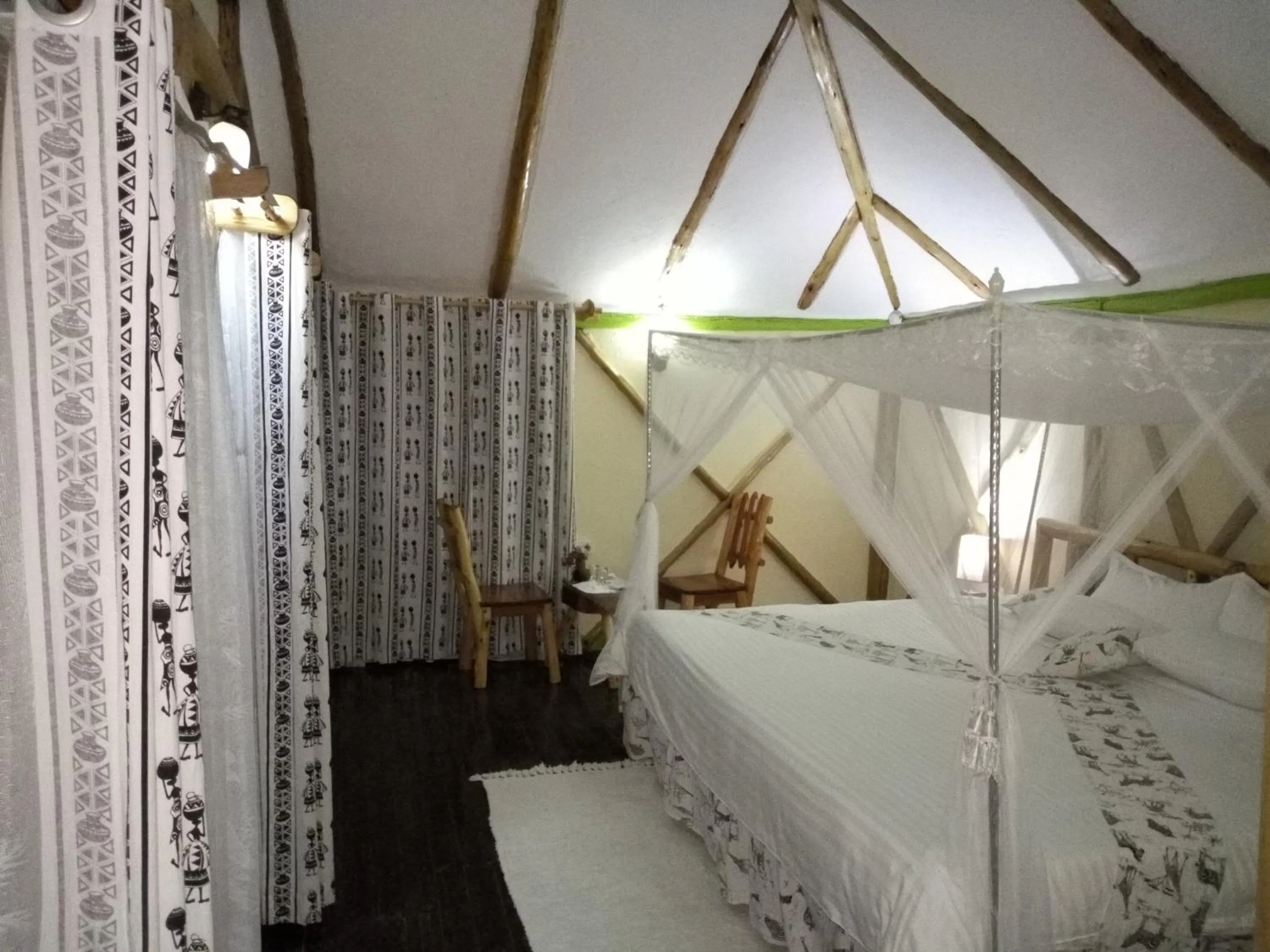 Bed in Lake Bunyonyi Rock Resort