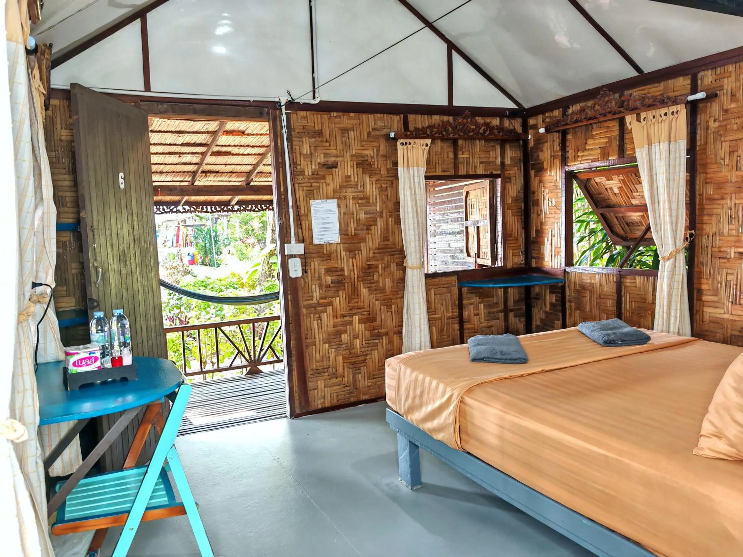 Bed in Bamboo Bungalows