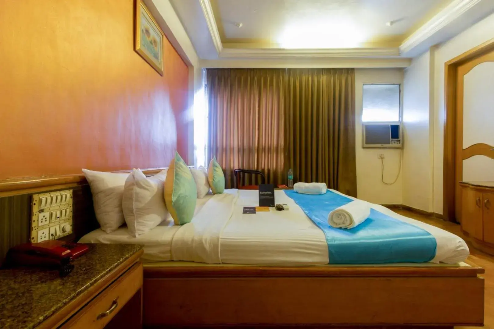 Bedroom, Bed in Celebrations Inn Pune Bedroom, Bed in Celebrations Inn Pune