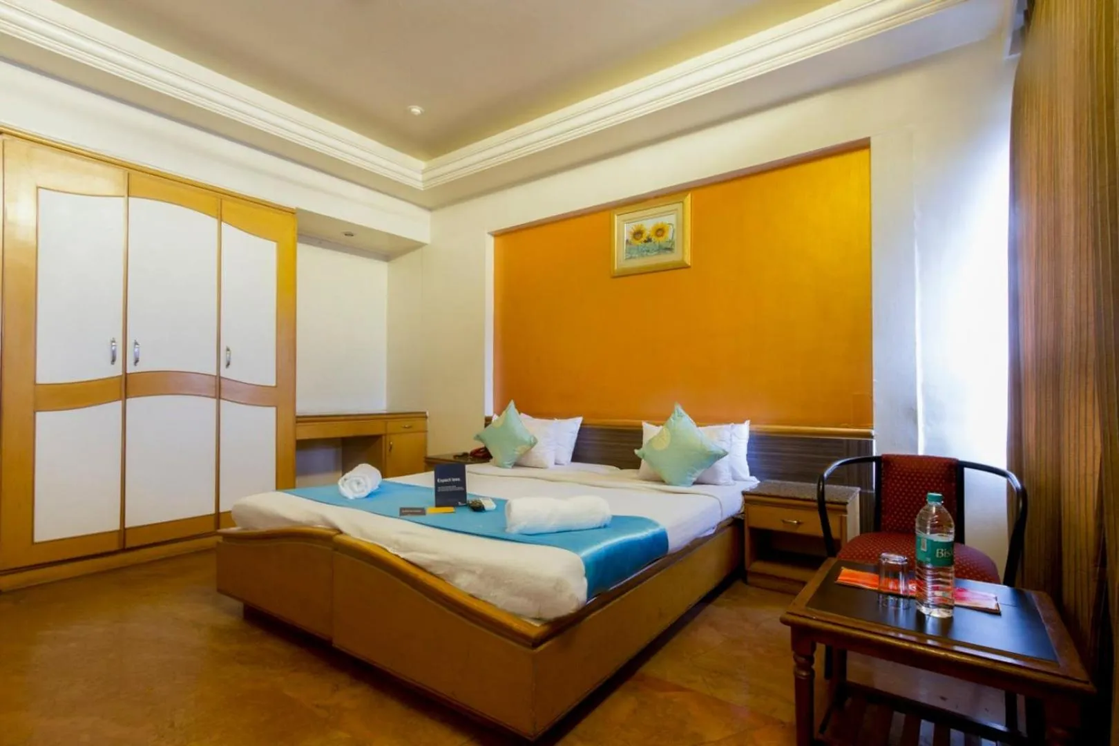 Bedroom, Bed in Celebrations Inn Pune