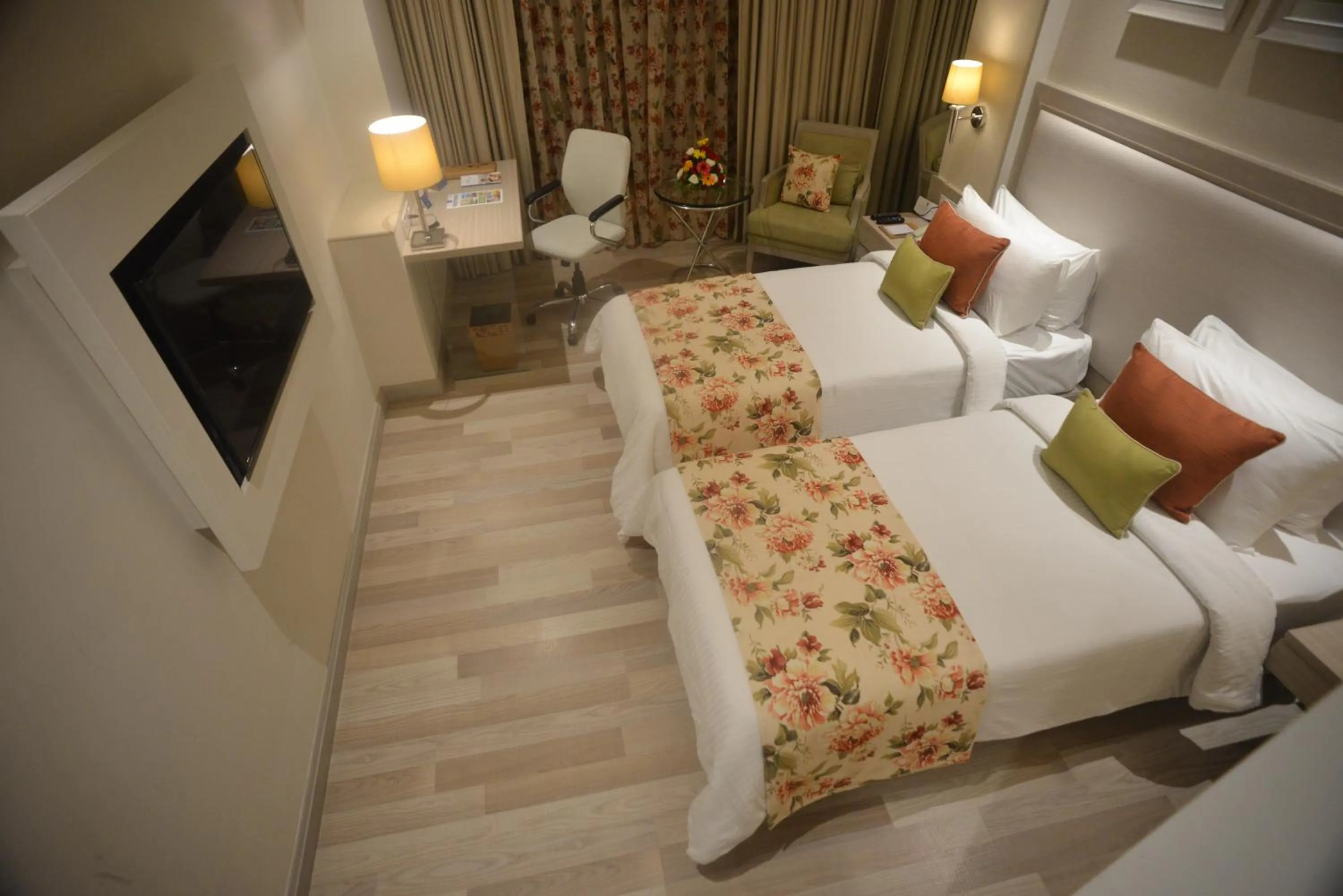 Bedroom, Bed in Efcee Sarovar Premiere Bhavnagar