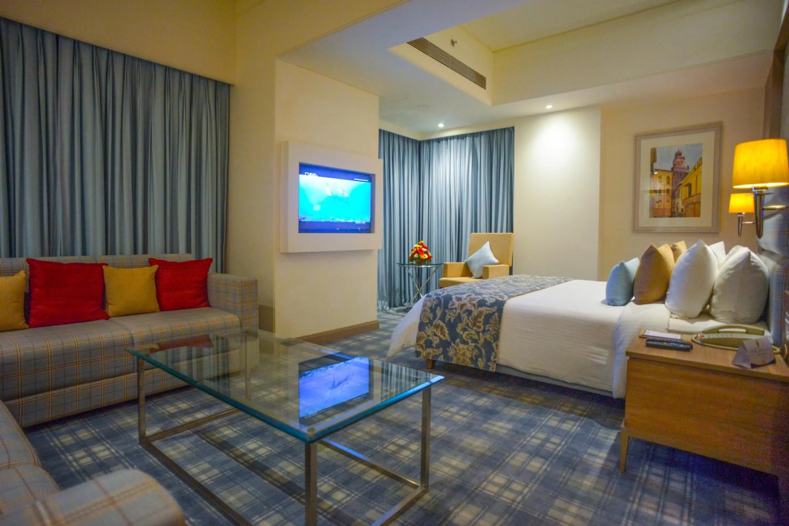 Bedroom, Bed in Efcee Sarovar Premiere Bhavnagar