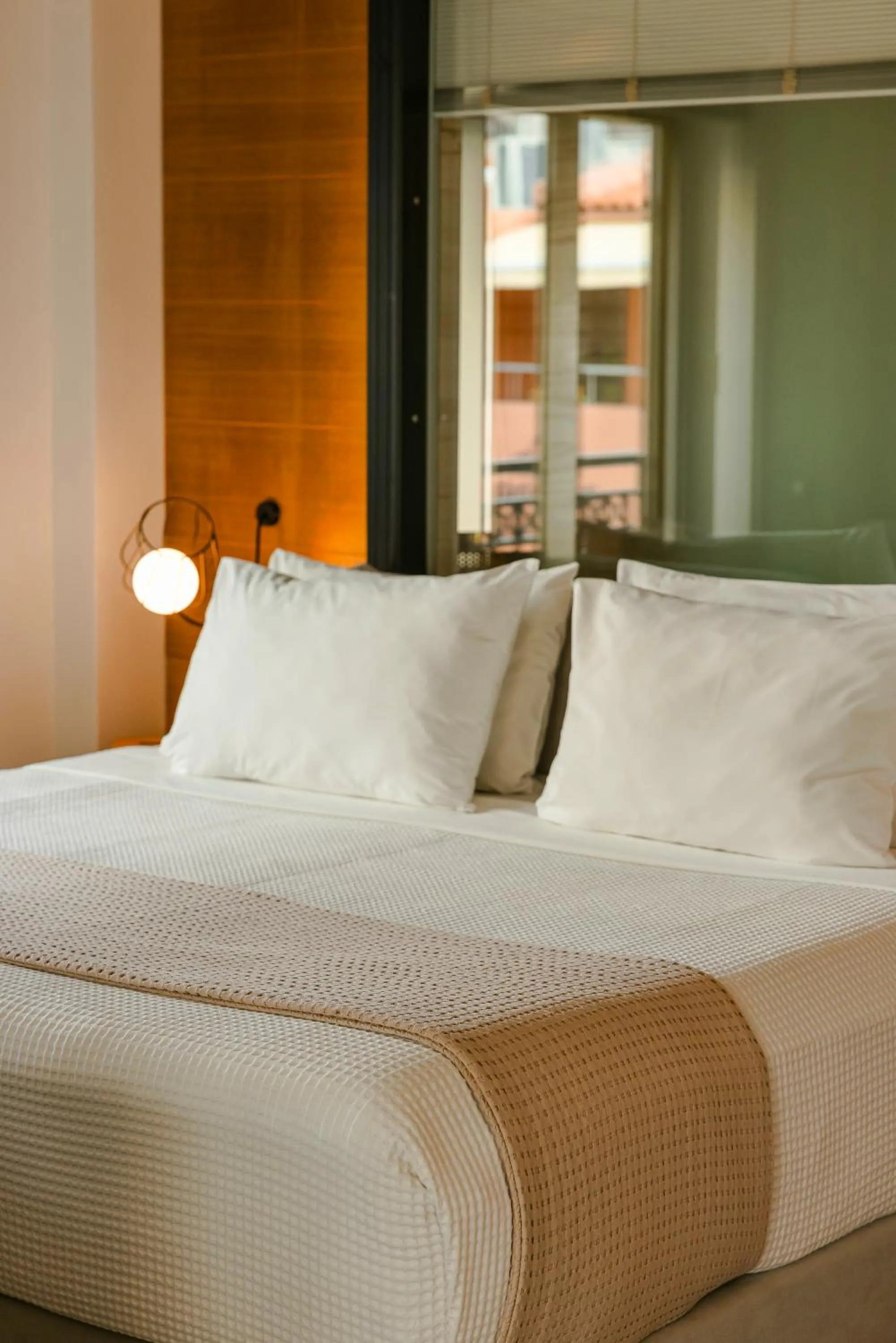 Bed in Querini Luxury Suites