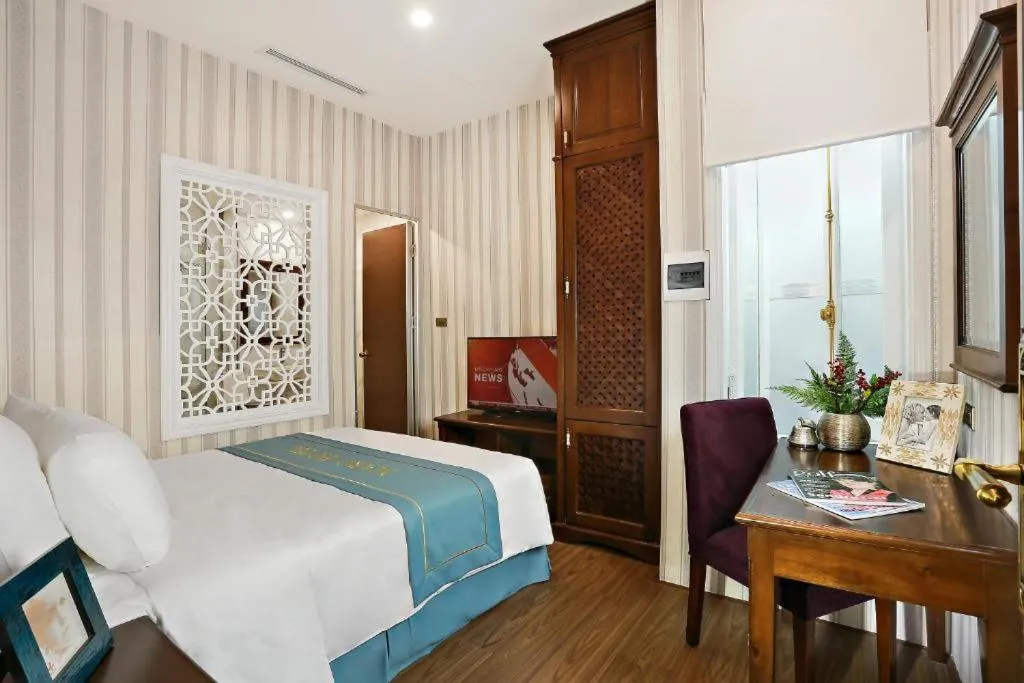 Bed in Maro Hotel
