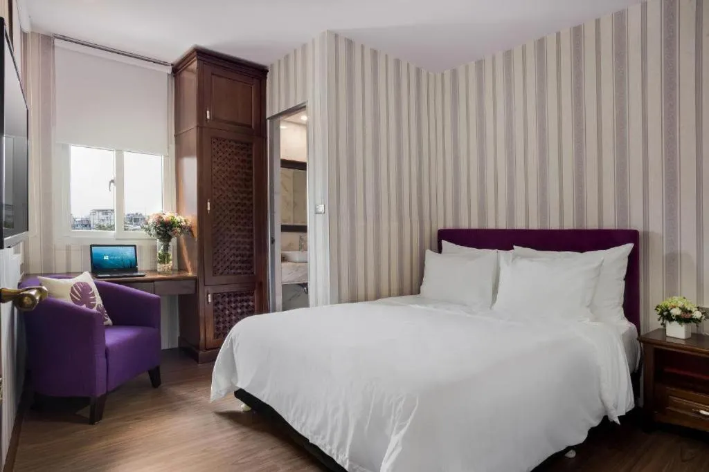 Bed in Maro Hotel