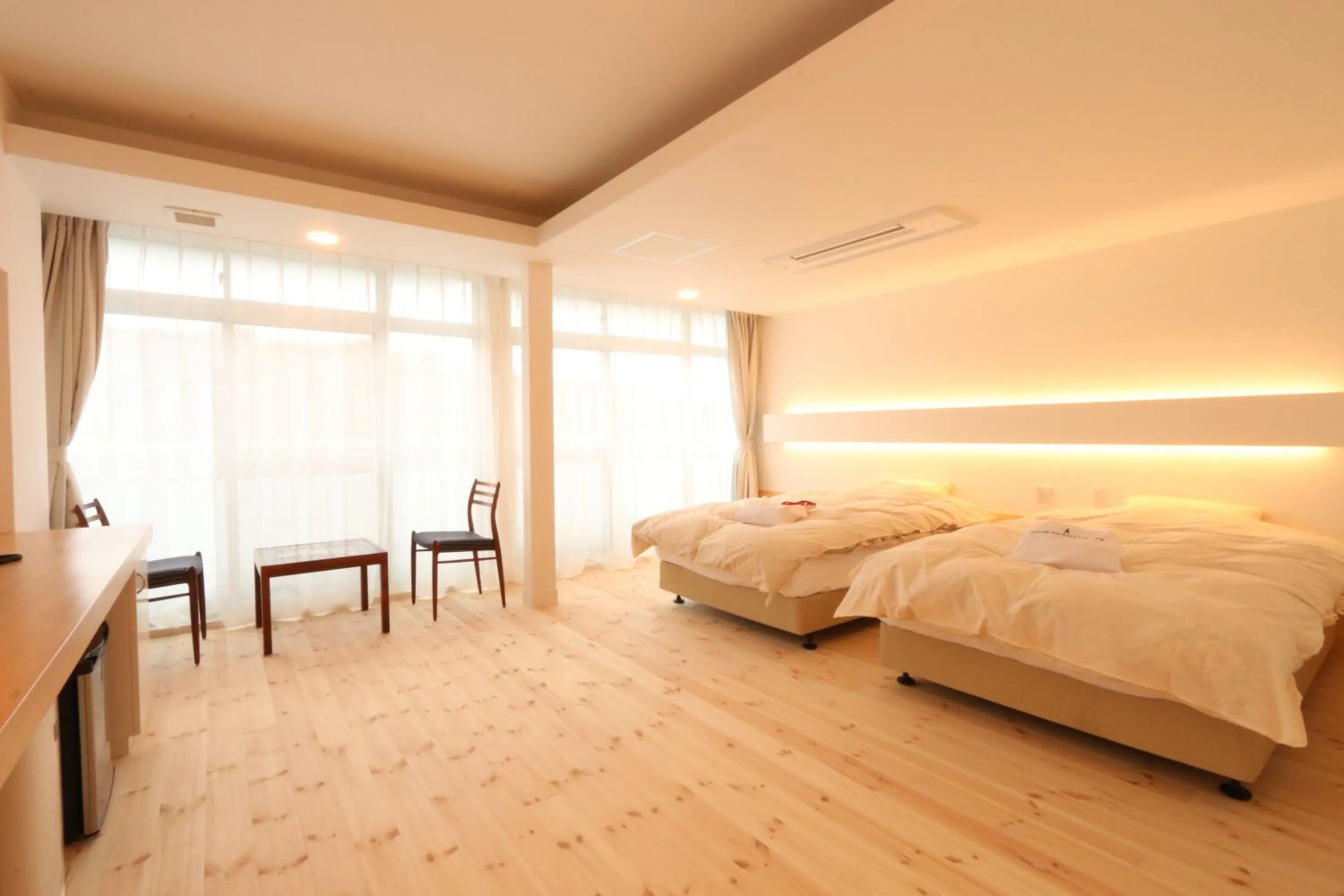 Bed in Amakusa Santacoming Hotel