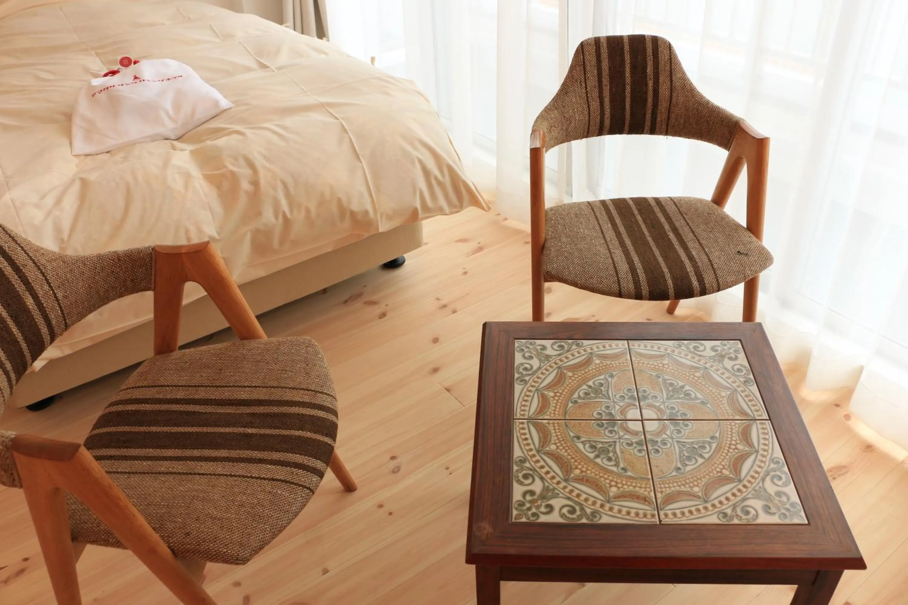 Bed in Amakusa Santacoming Hotel